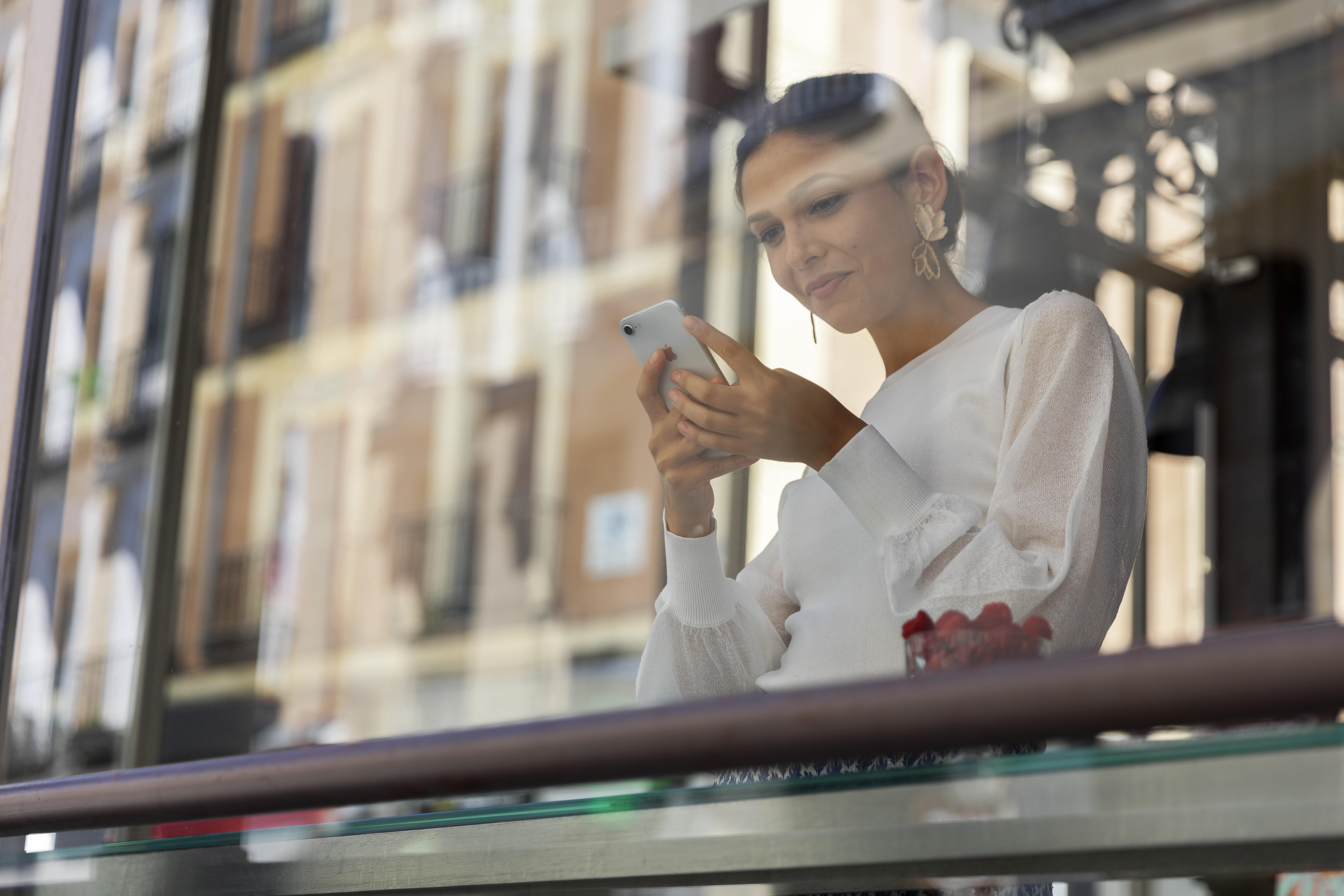a woman looking at her phone