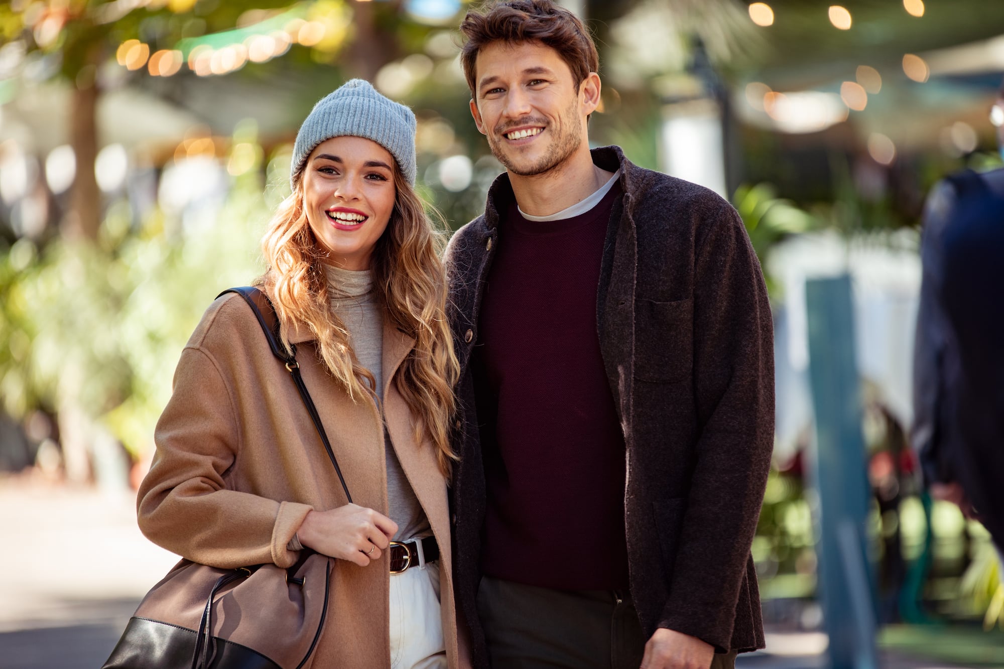a man and woman smiling