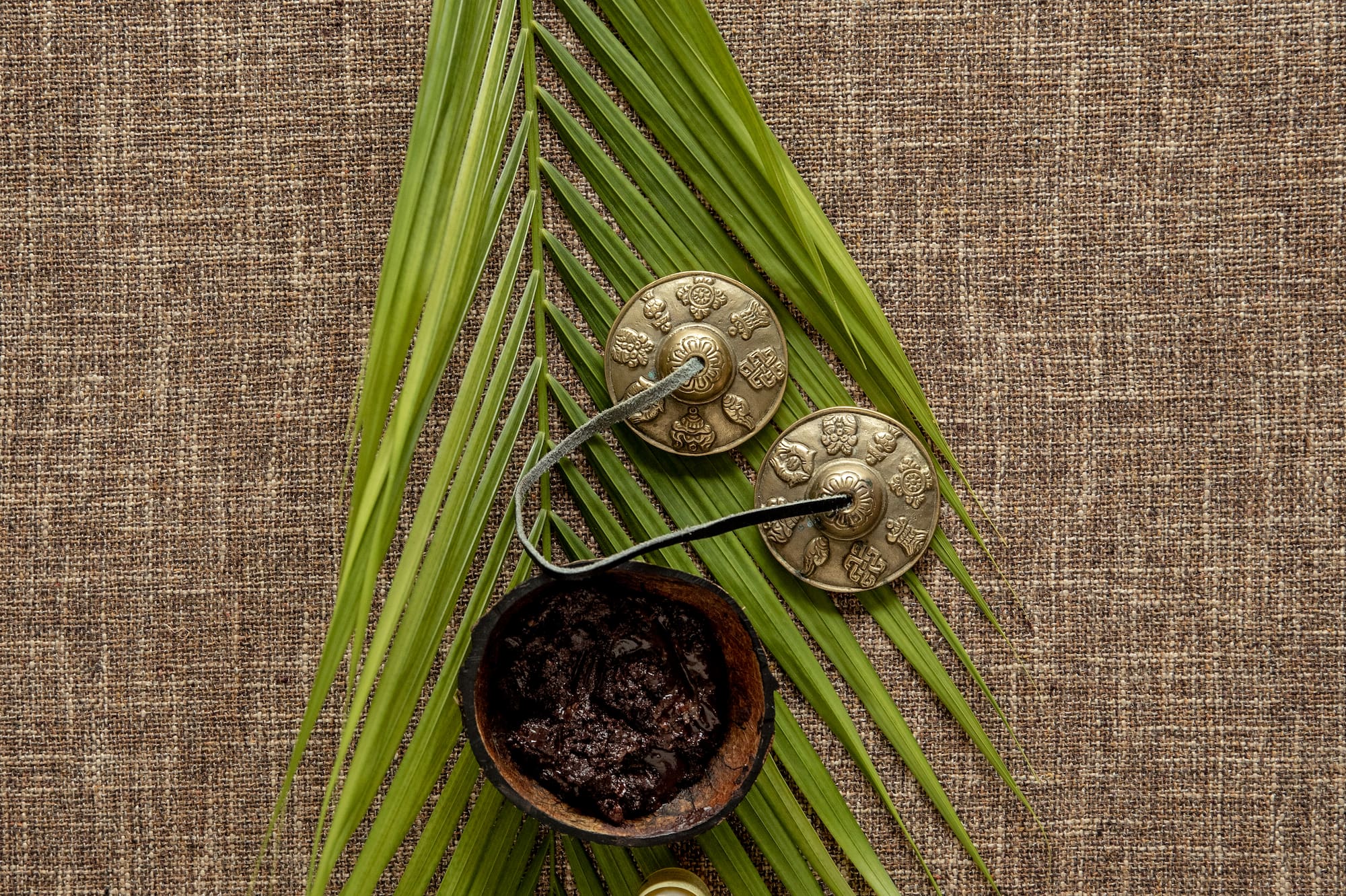 a leaf with a bowl and a pipe on it