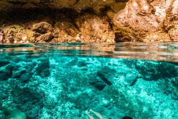 a man swimming under water