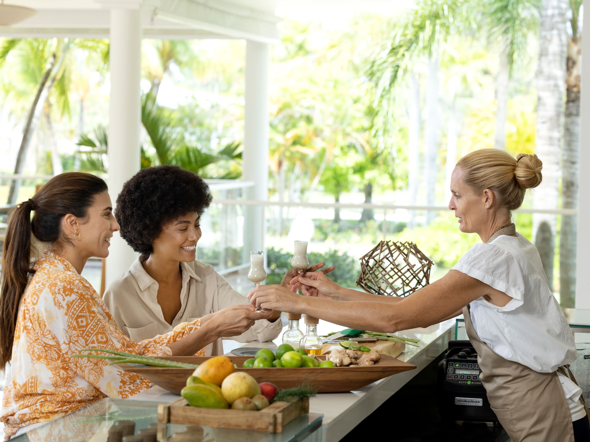 a group of women sitting at a table