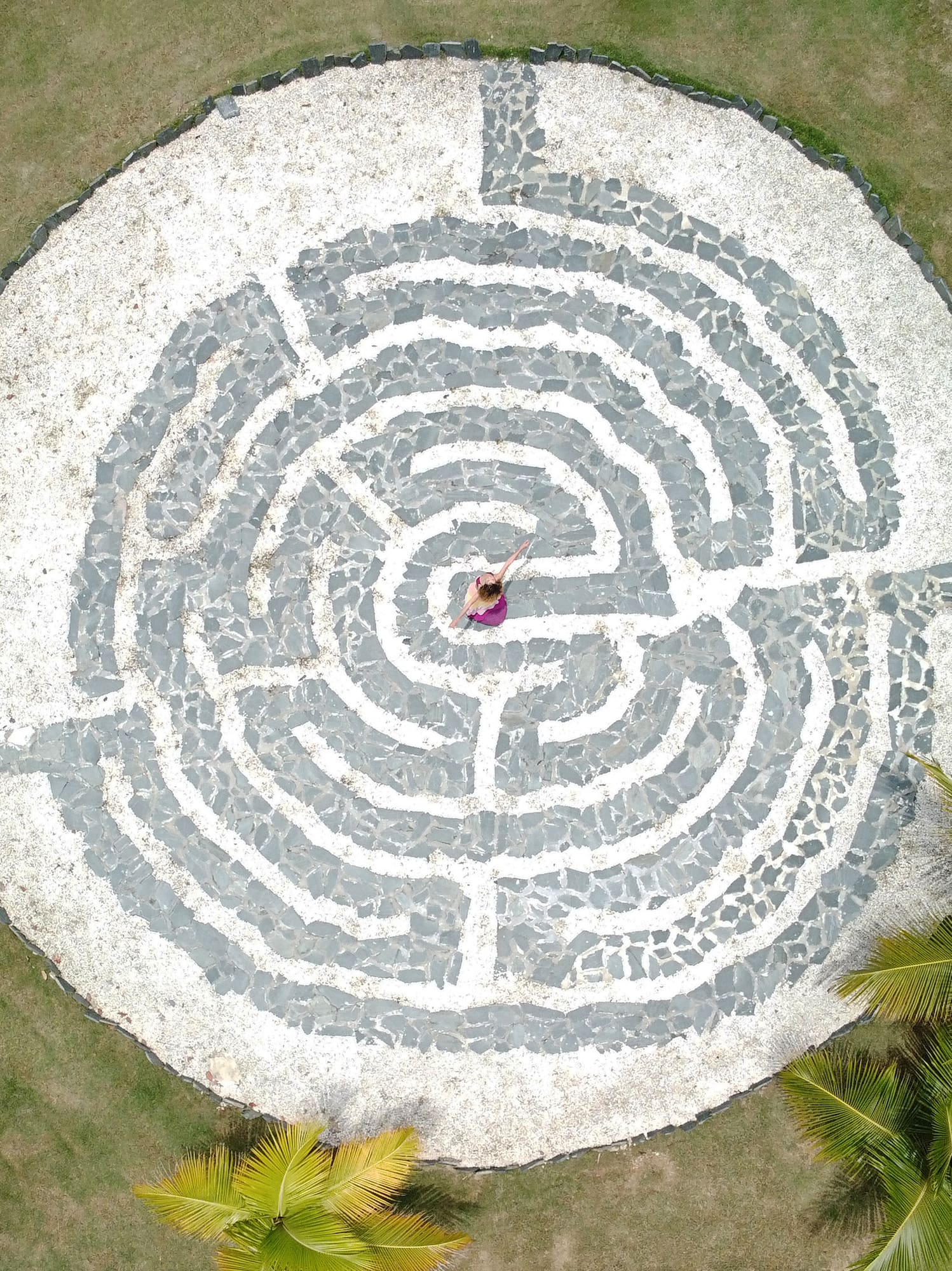 a woman in a circular maze