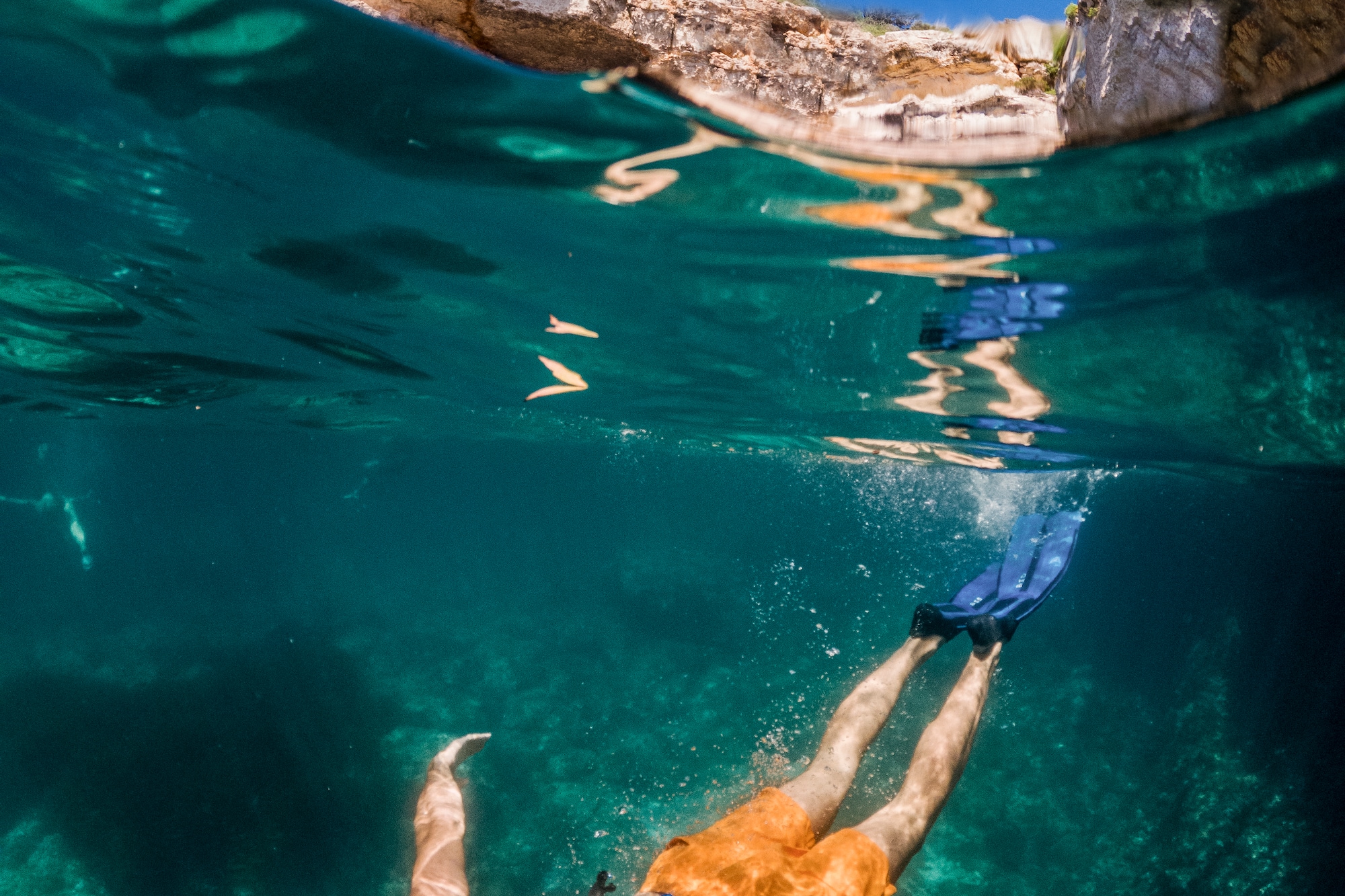 a man swimming under water