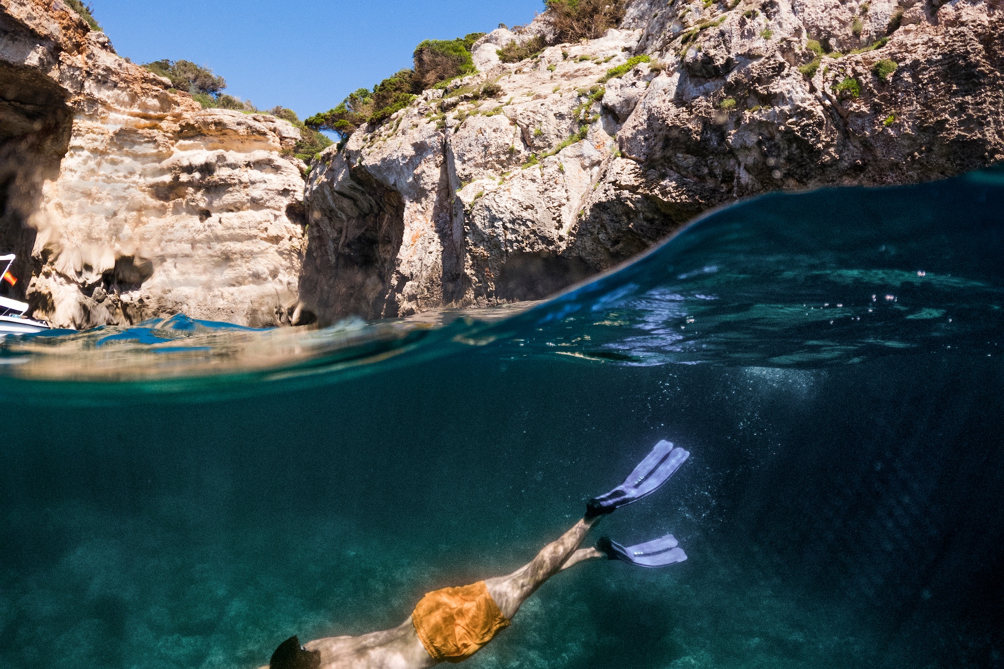 a man swimming under water