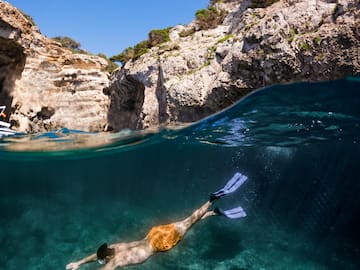 a man swimming under water