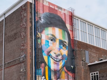 a mural of a woman on a building