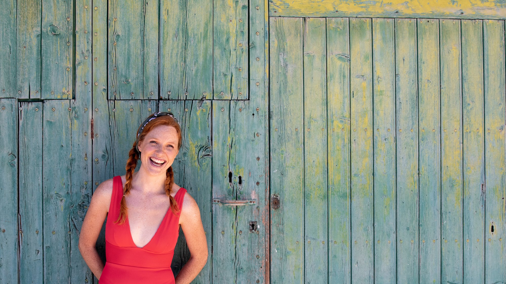a woman in a red swimsuit
