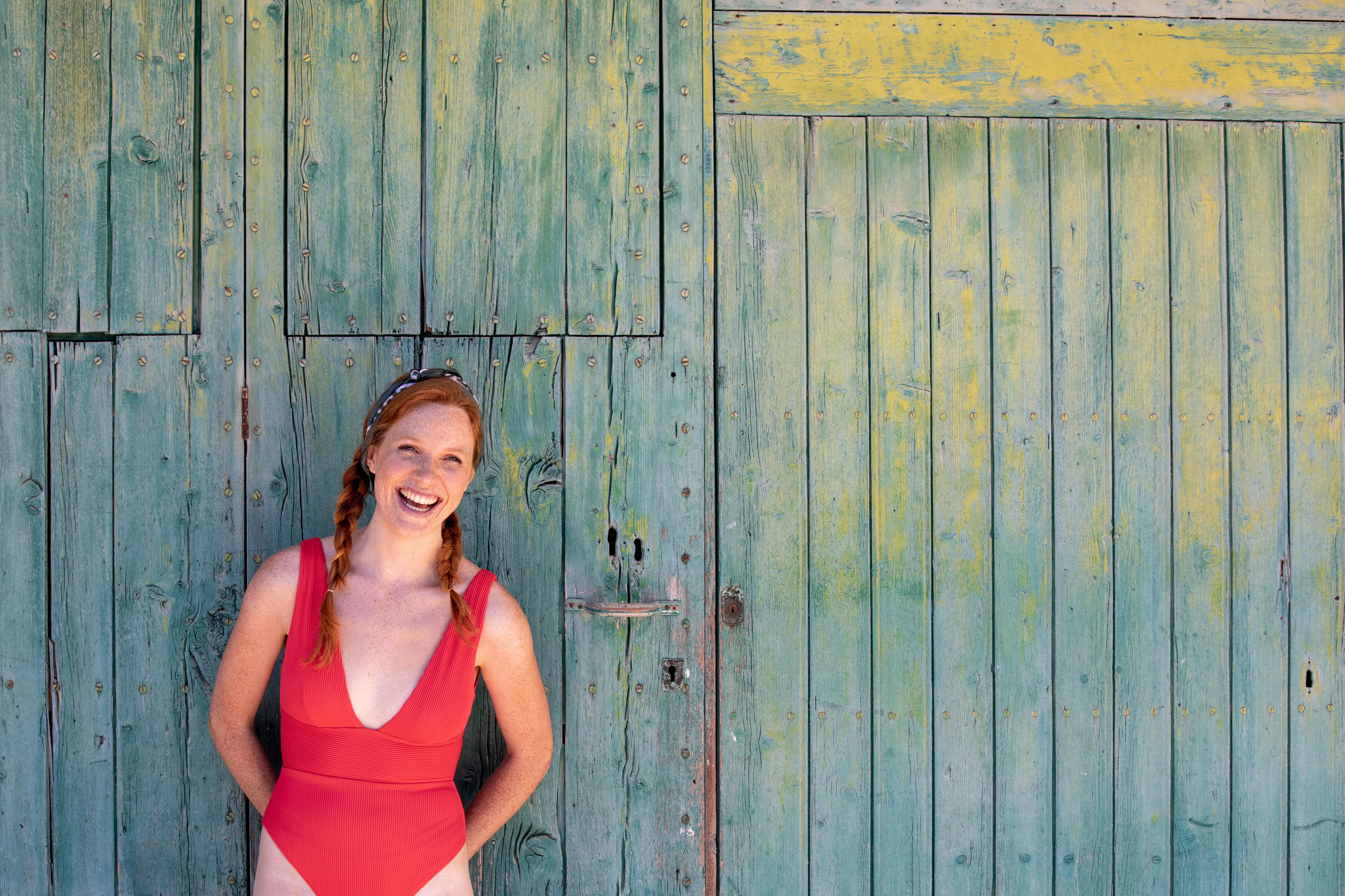 a woman in a red swimsuit