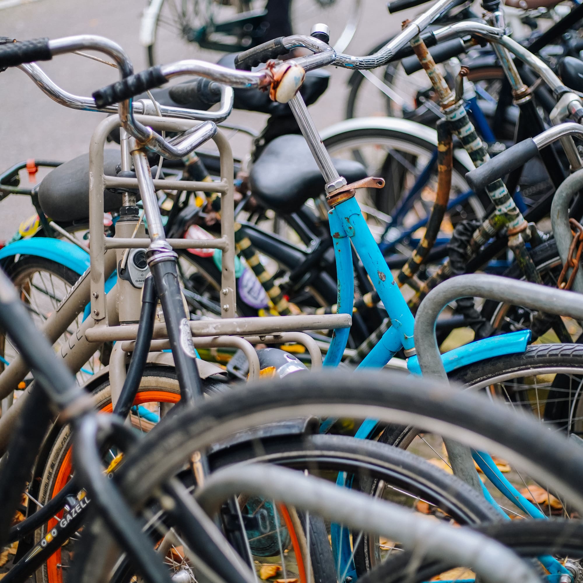 a group of bicycles parked on the street