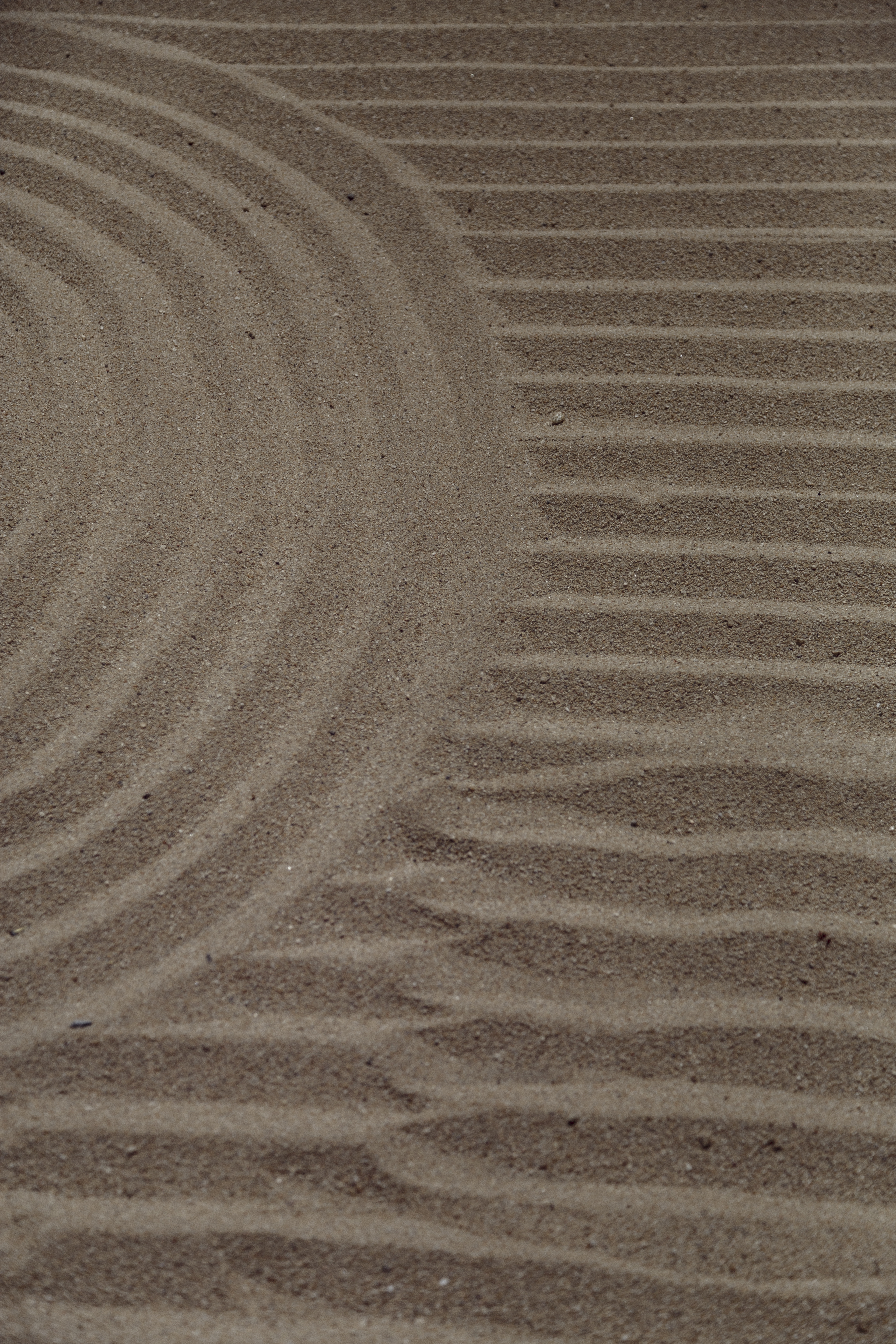 a circular pattern in sand