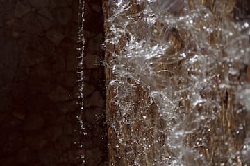 water flowing water from a fountain
