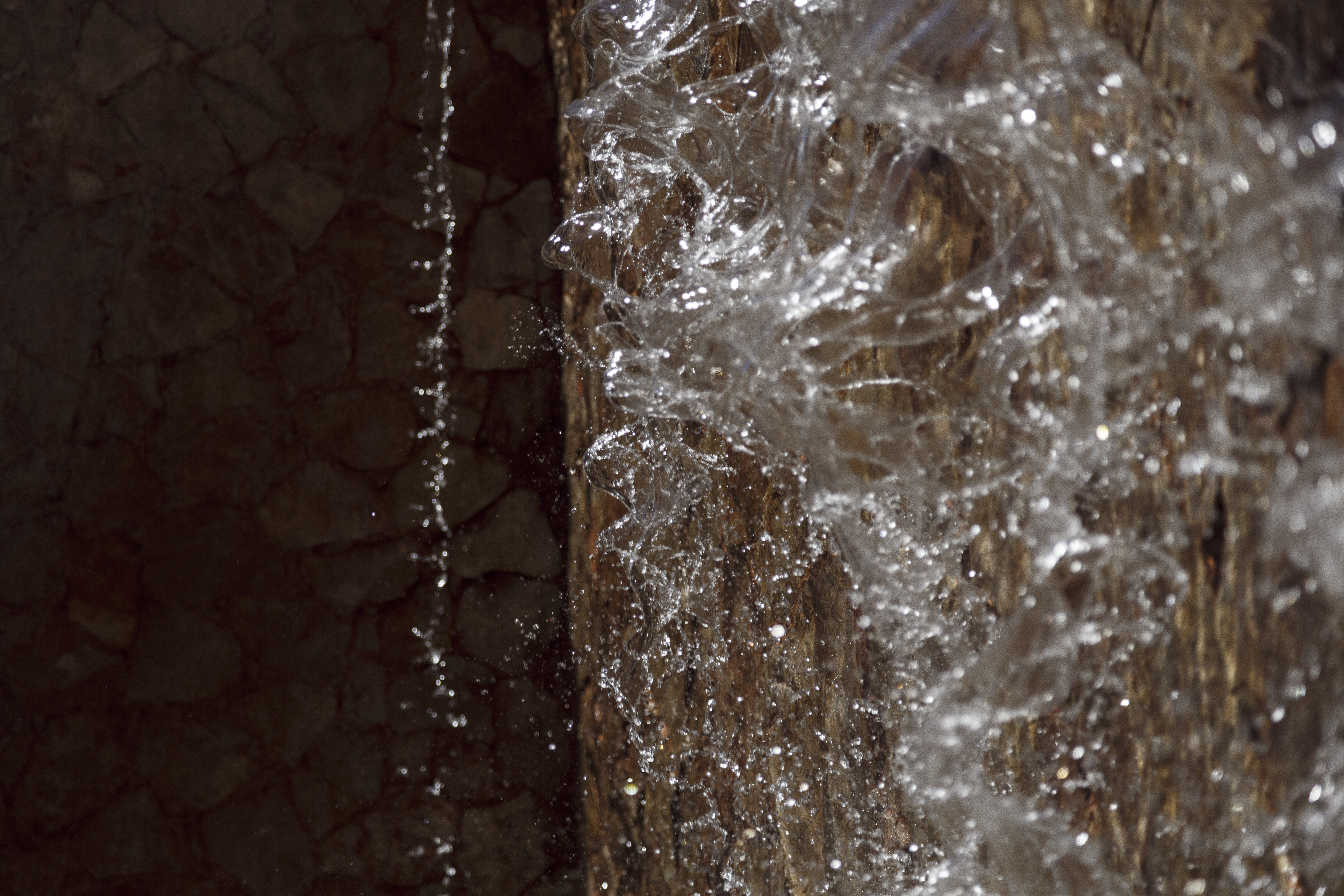 water flowing water from a fountain