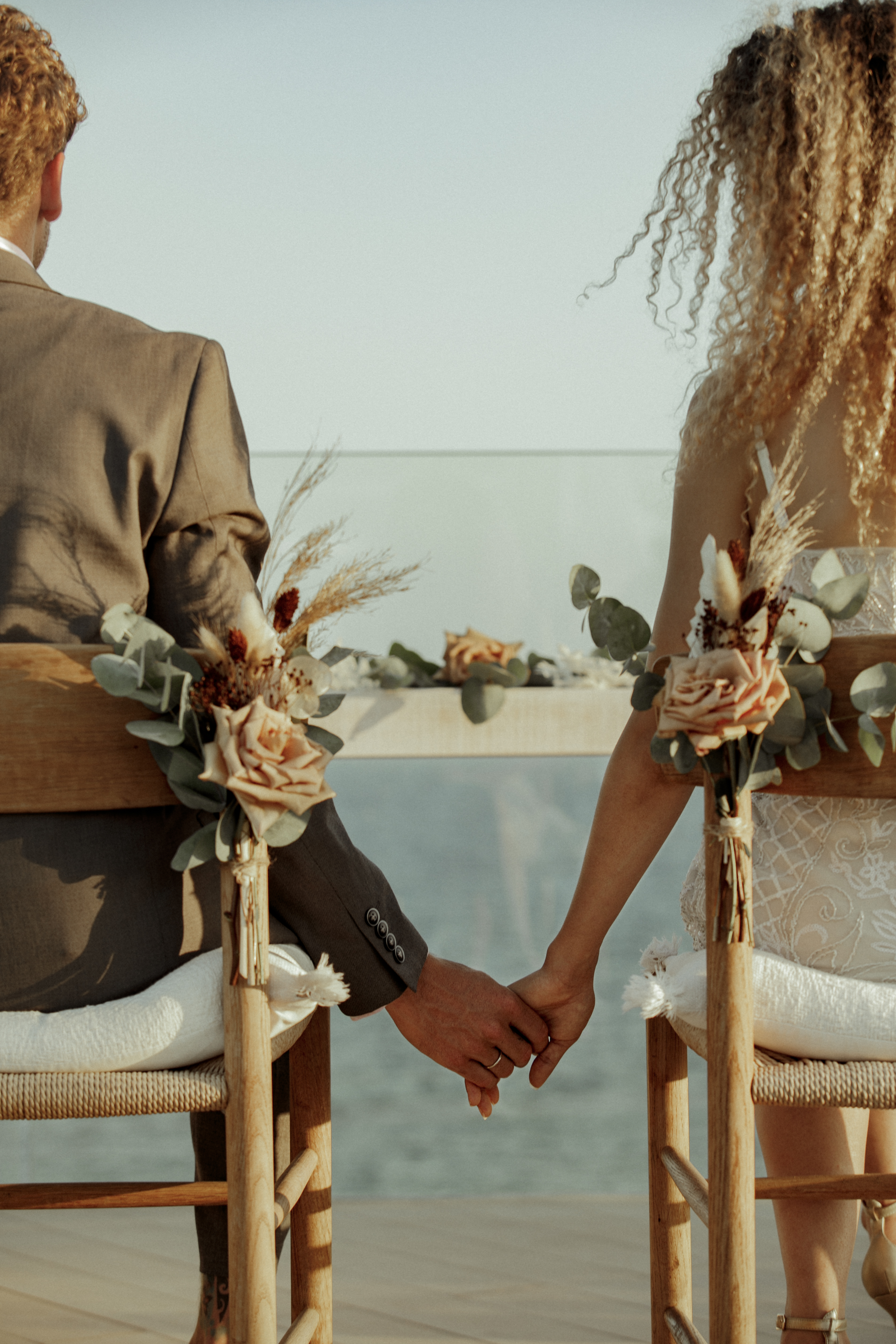 a man and woman holding hands