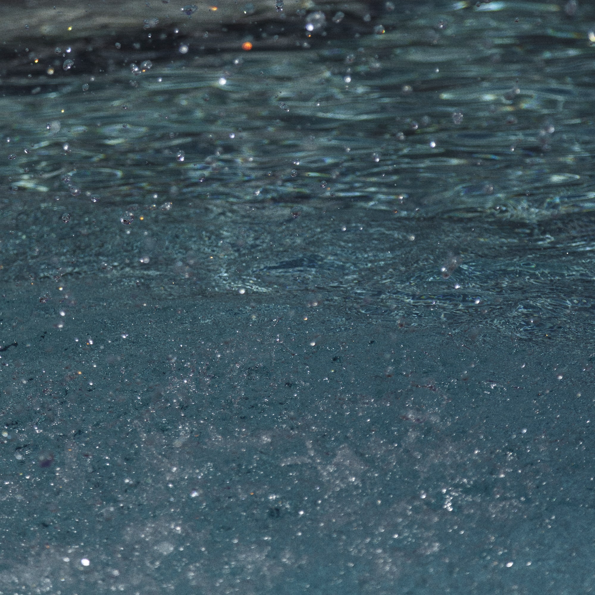 water splashing water in a pool