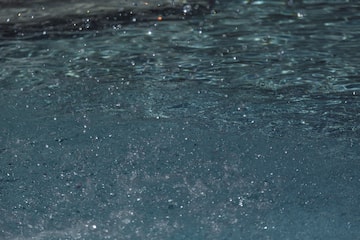 water splashing water in a pool