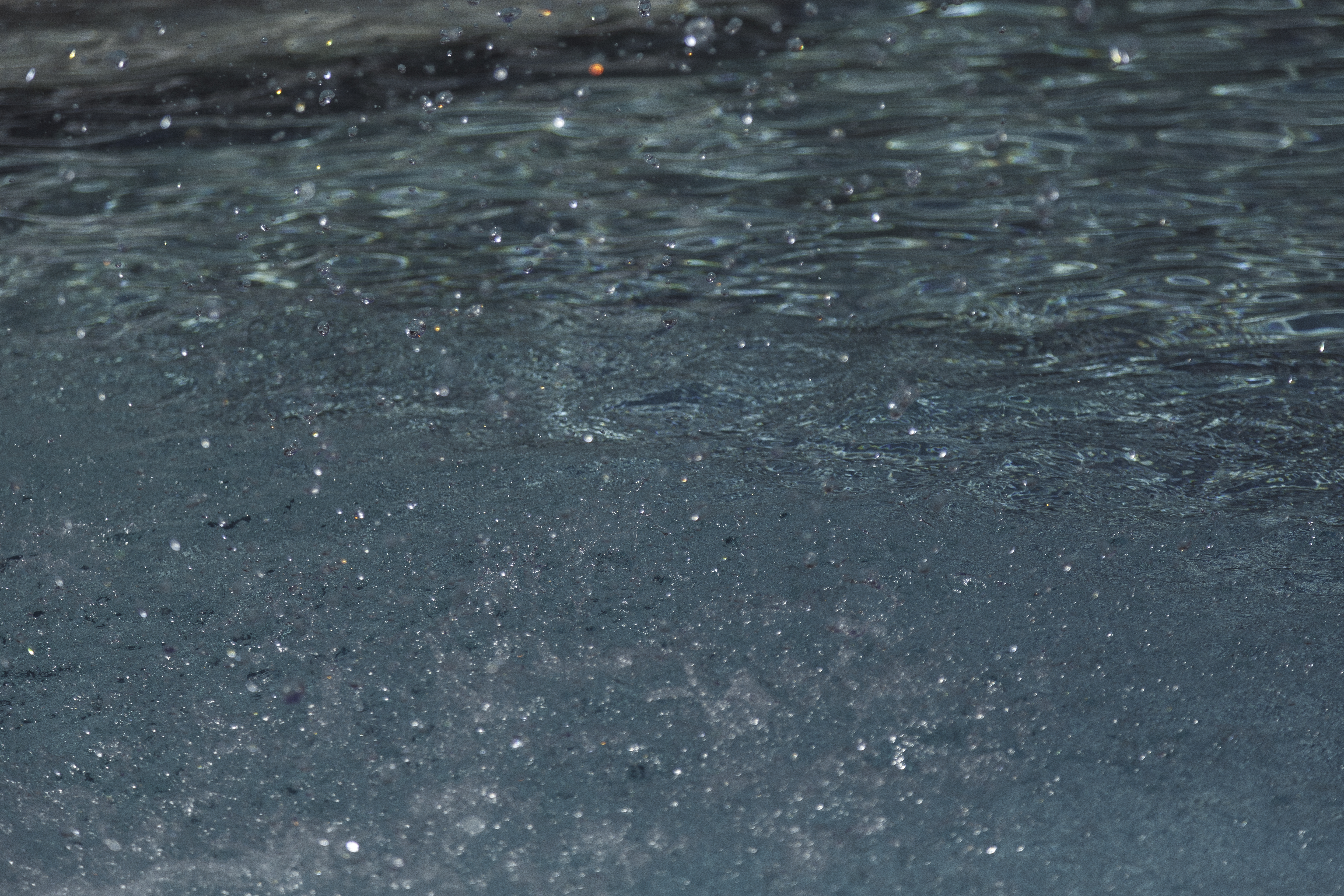 water splashing water in a pool