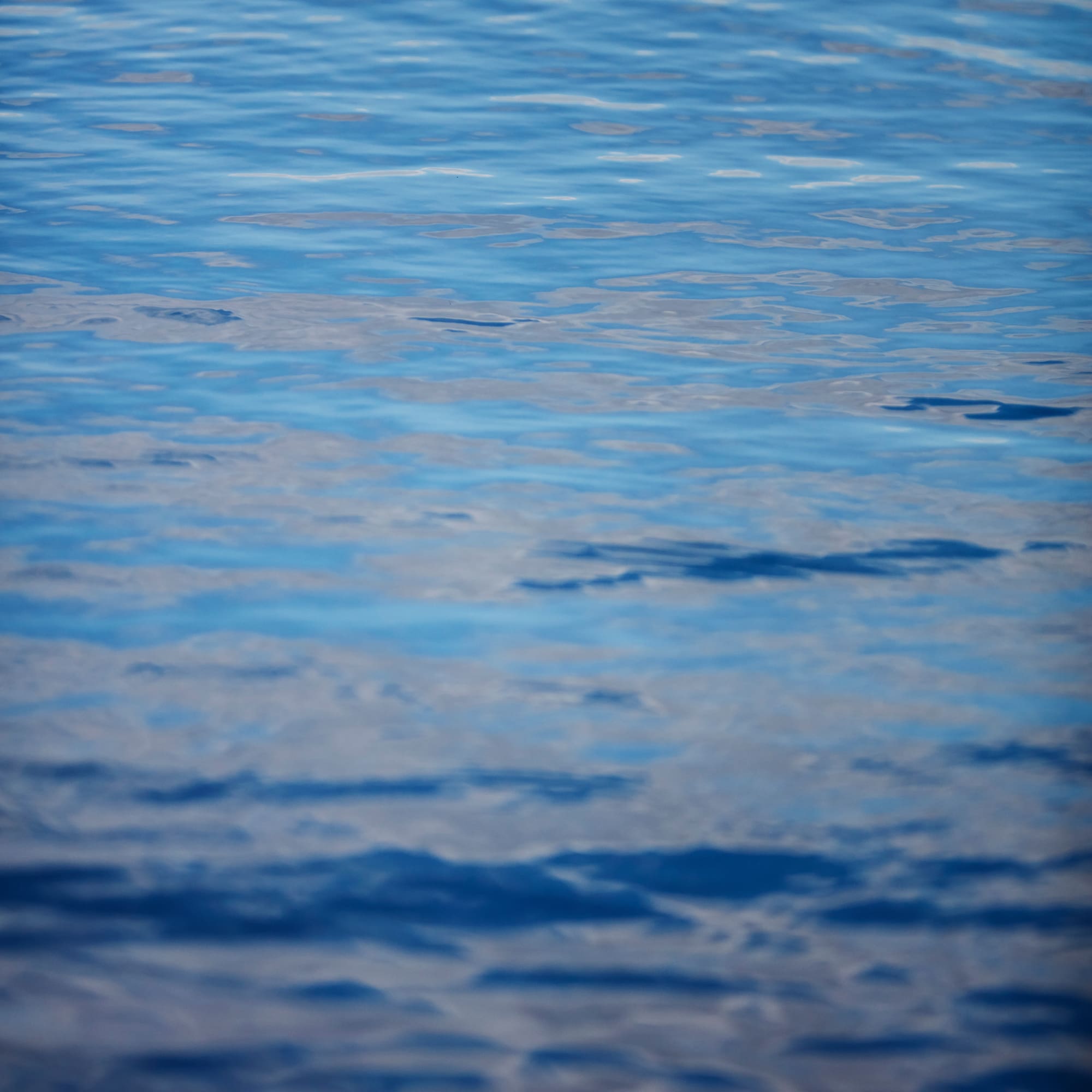 a white background with black and white clouds