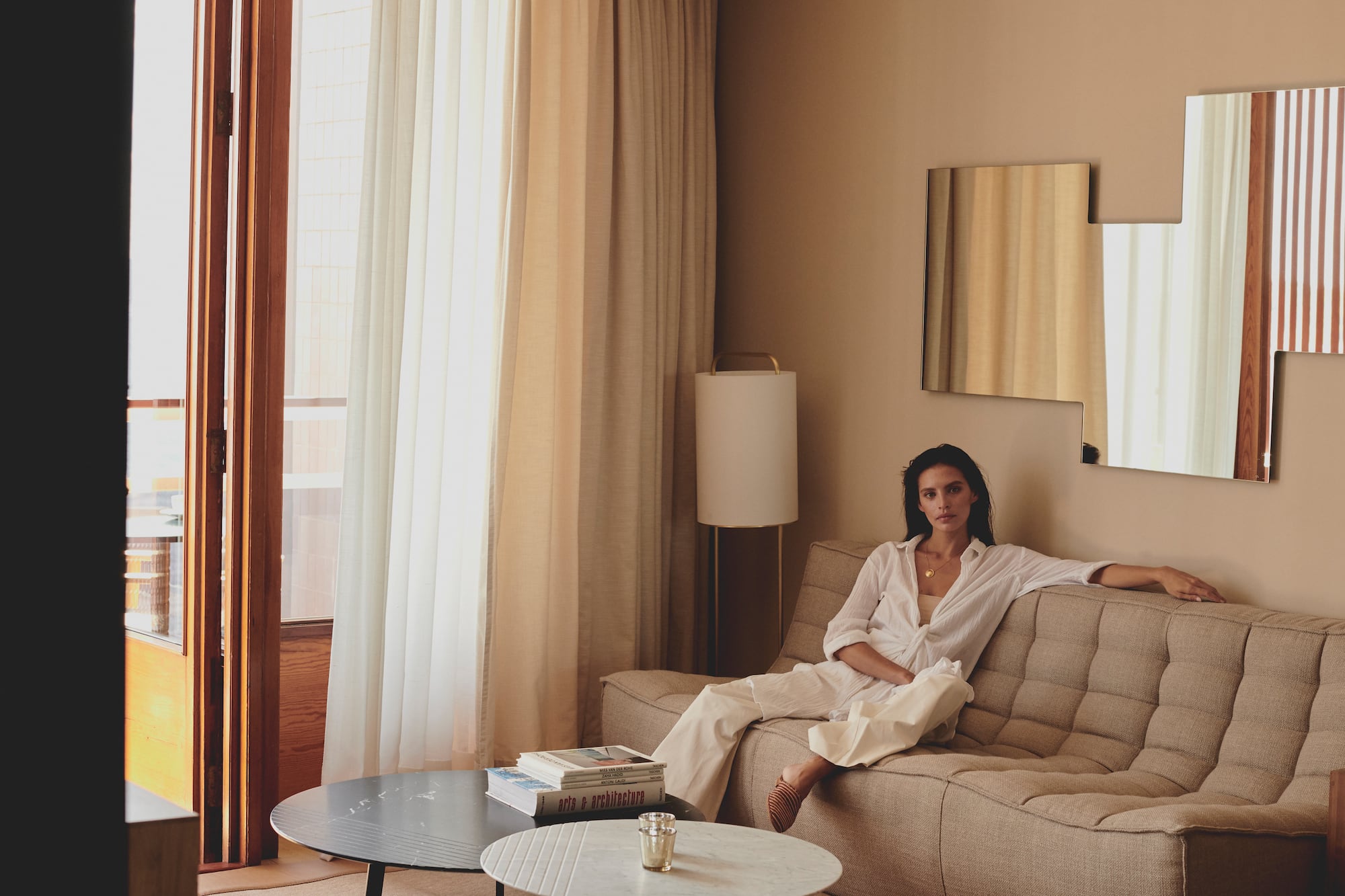 a woman sitting on a couch