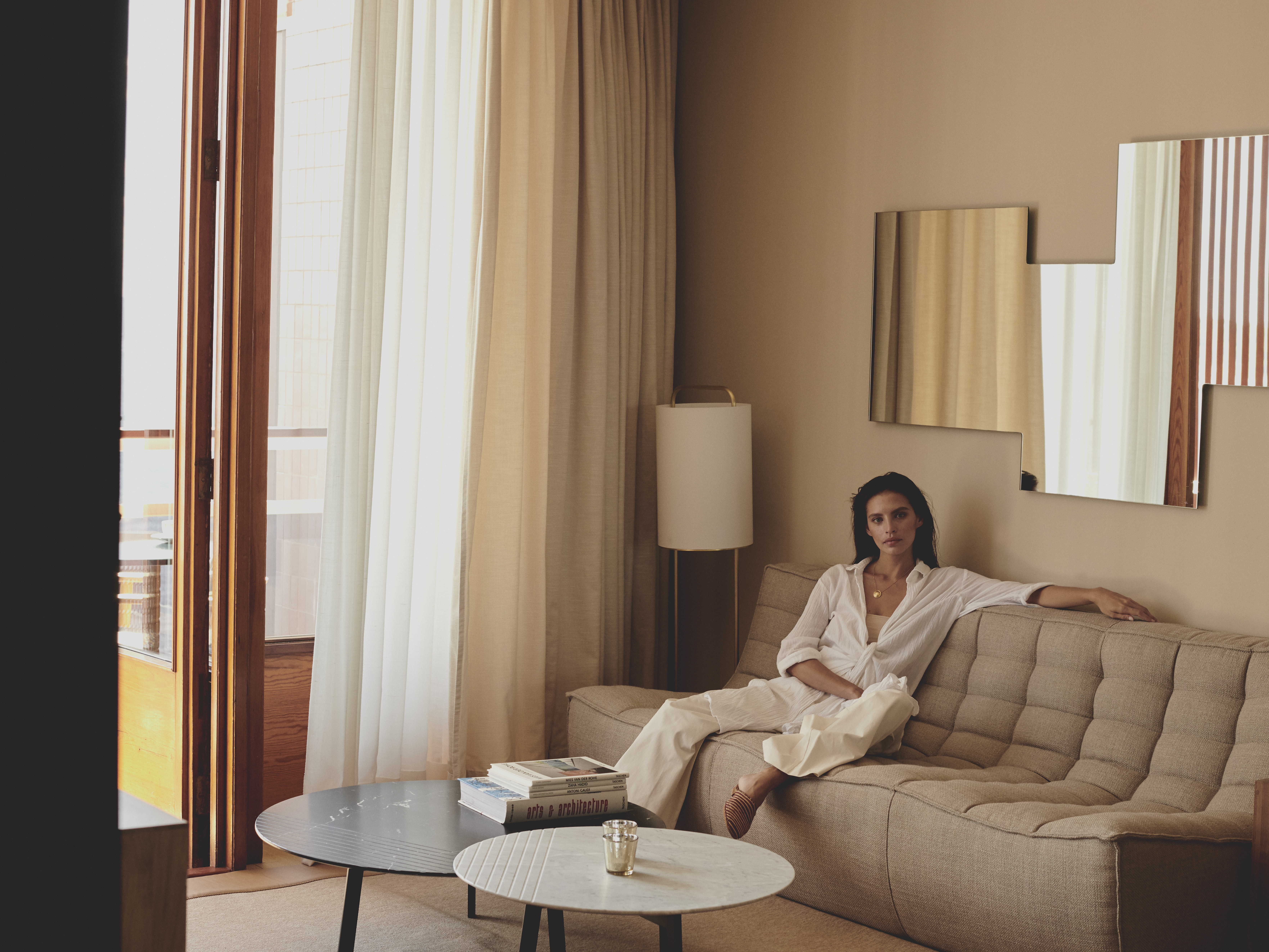 a woman sitting on a couch