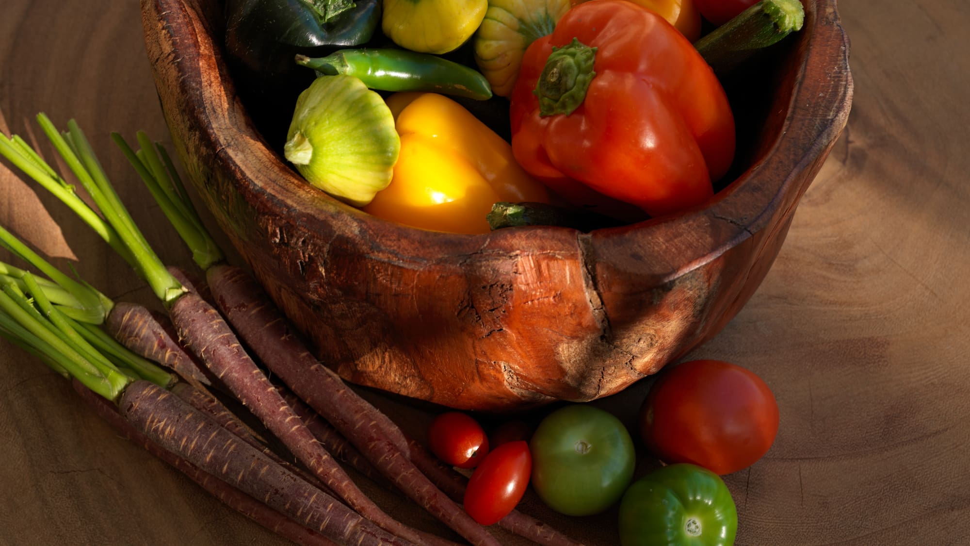 a bowl of vegetables on a table