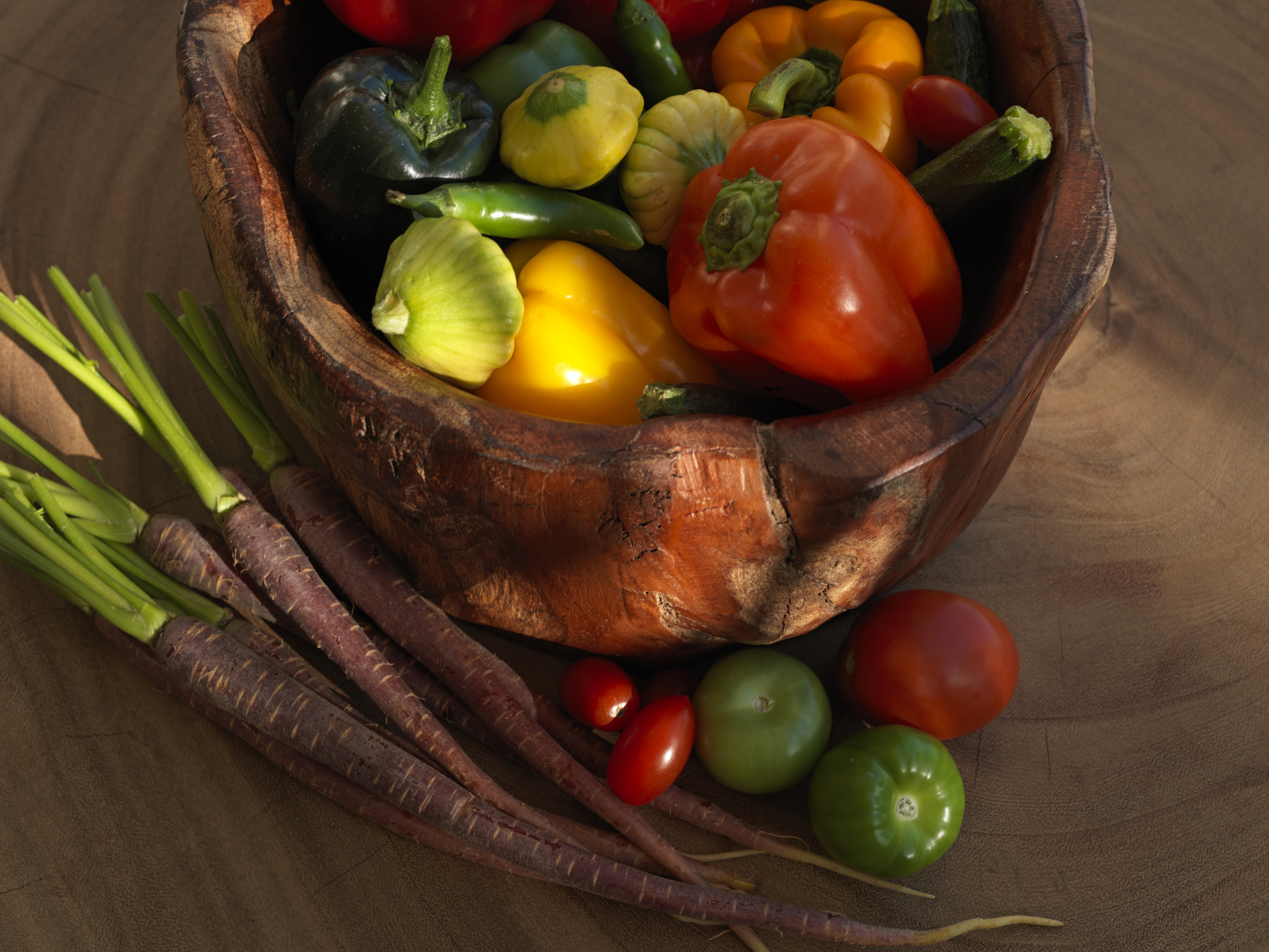 a bowl of vegetables on a table