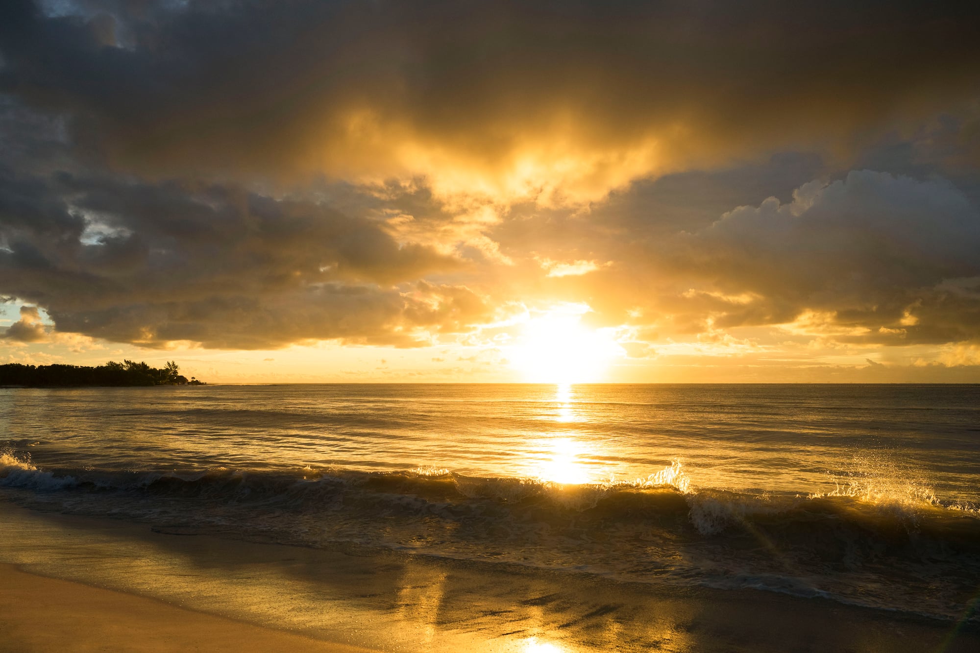 a sunset over a beach