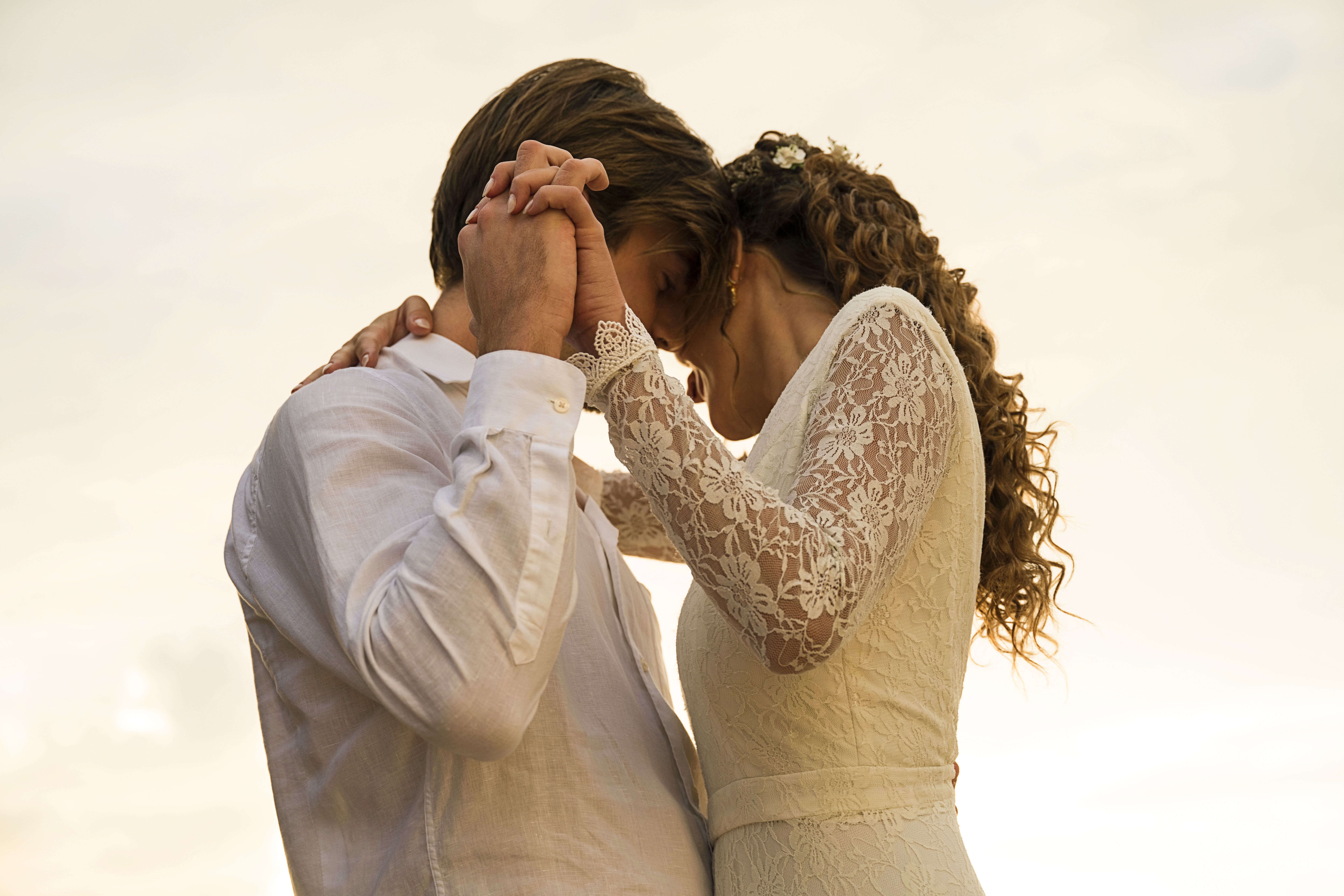 a man and woman holding hands
