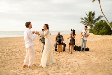a group of people on a beach