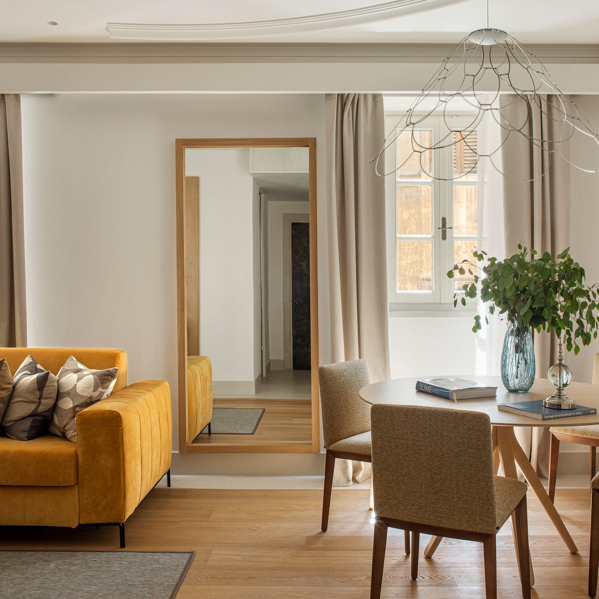 a living room with a couch and a table
