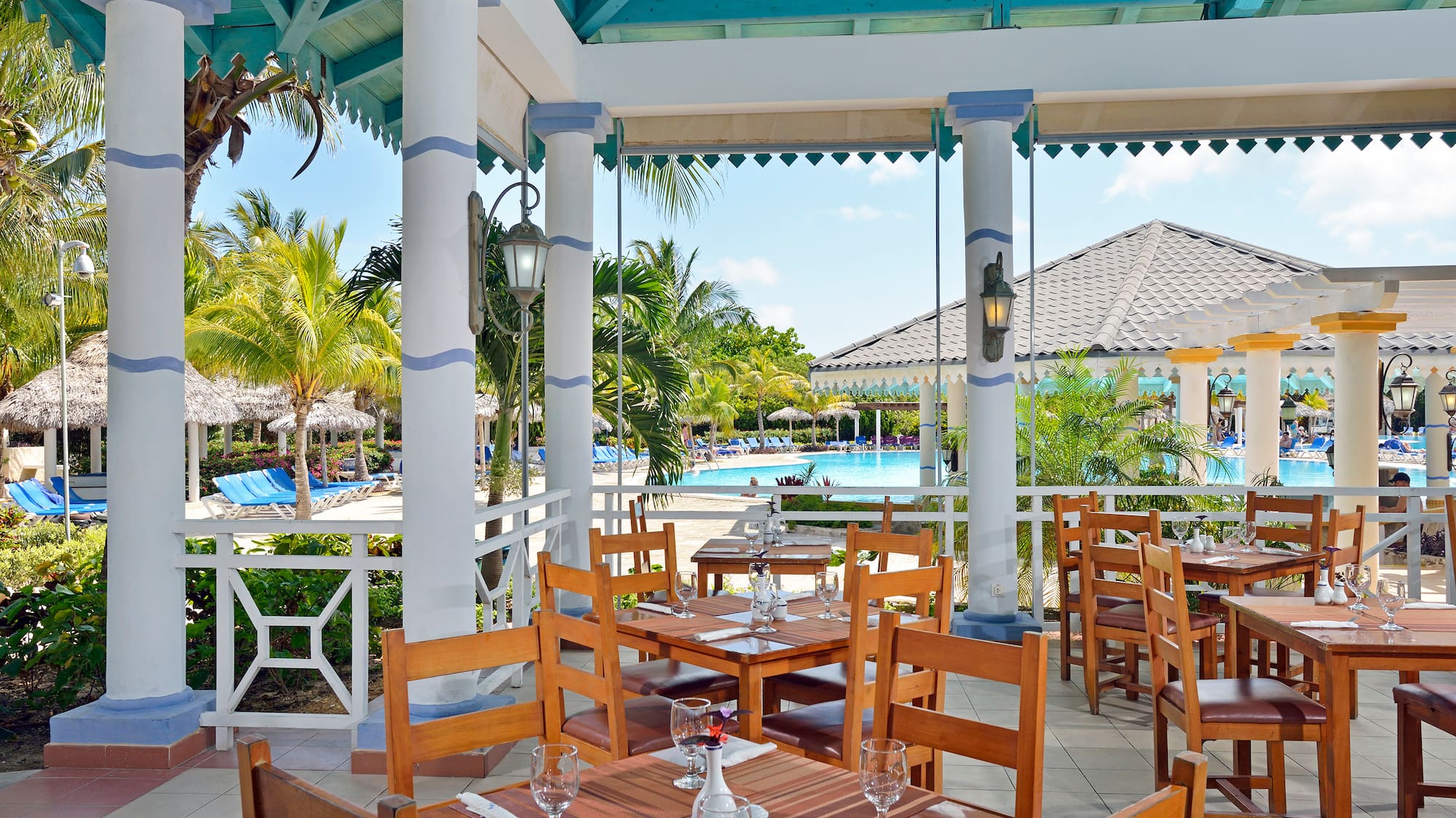 a restaurant with tables and chairs