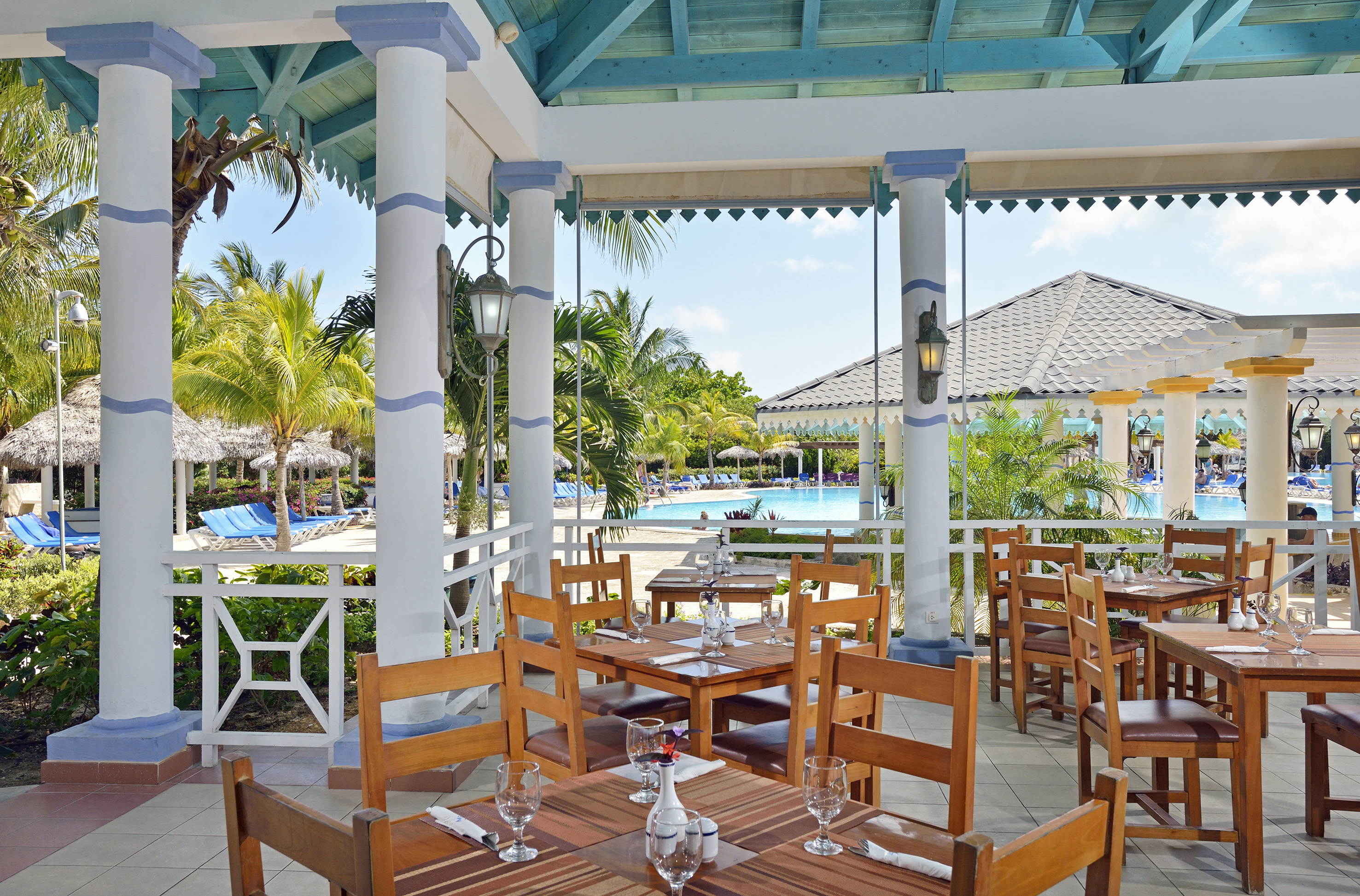 a restaurant with tables and chairs
