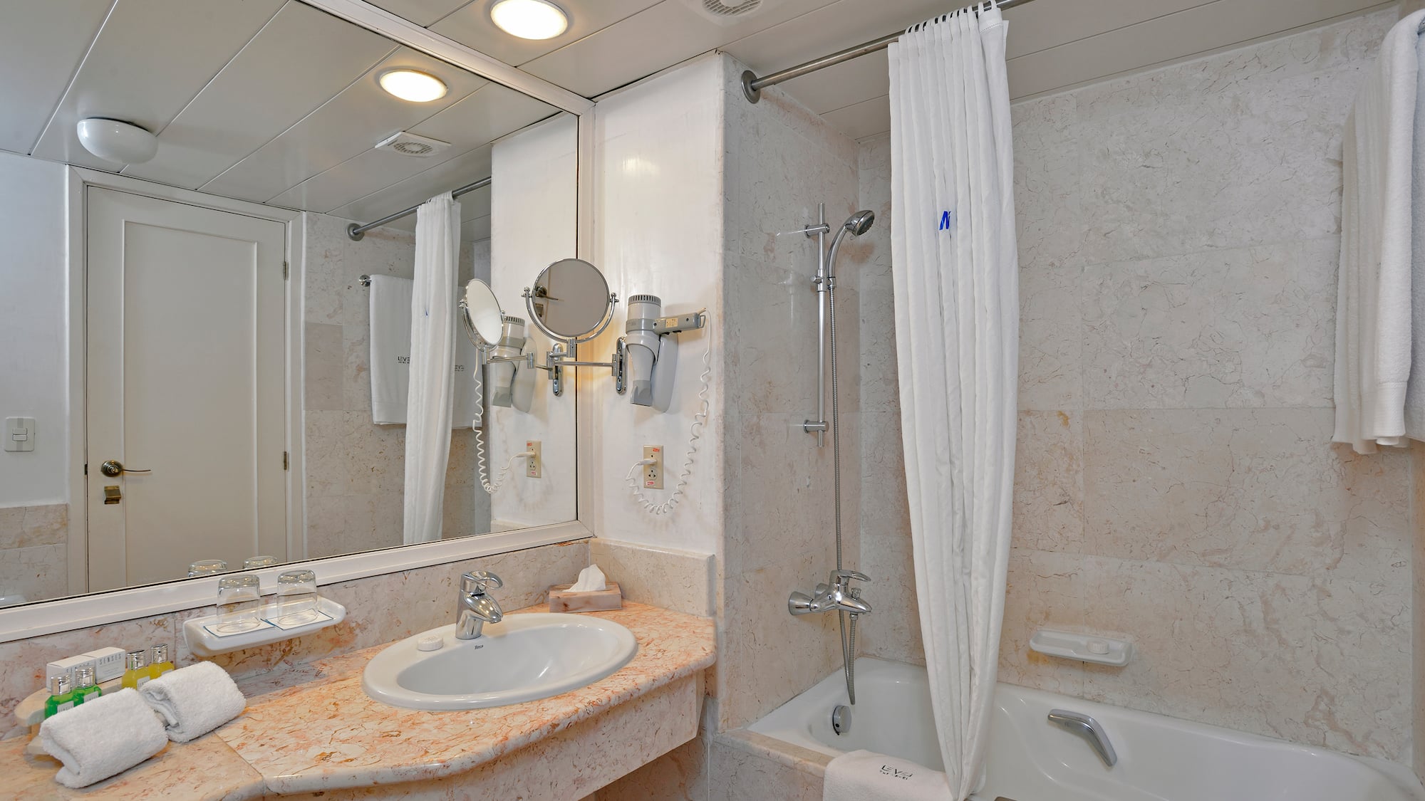 a bathroom with a sink and bathtub