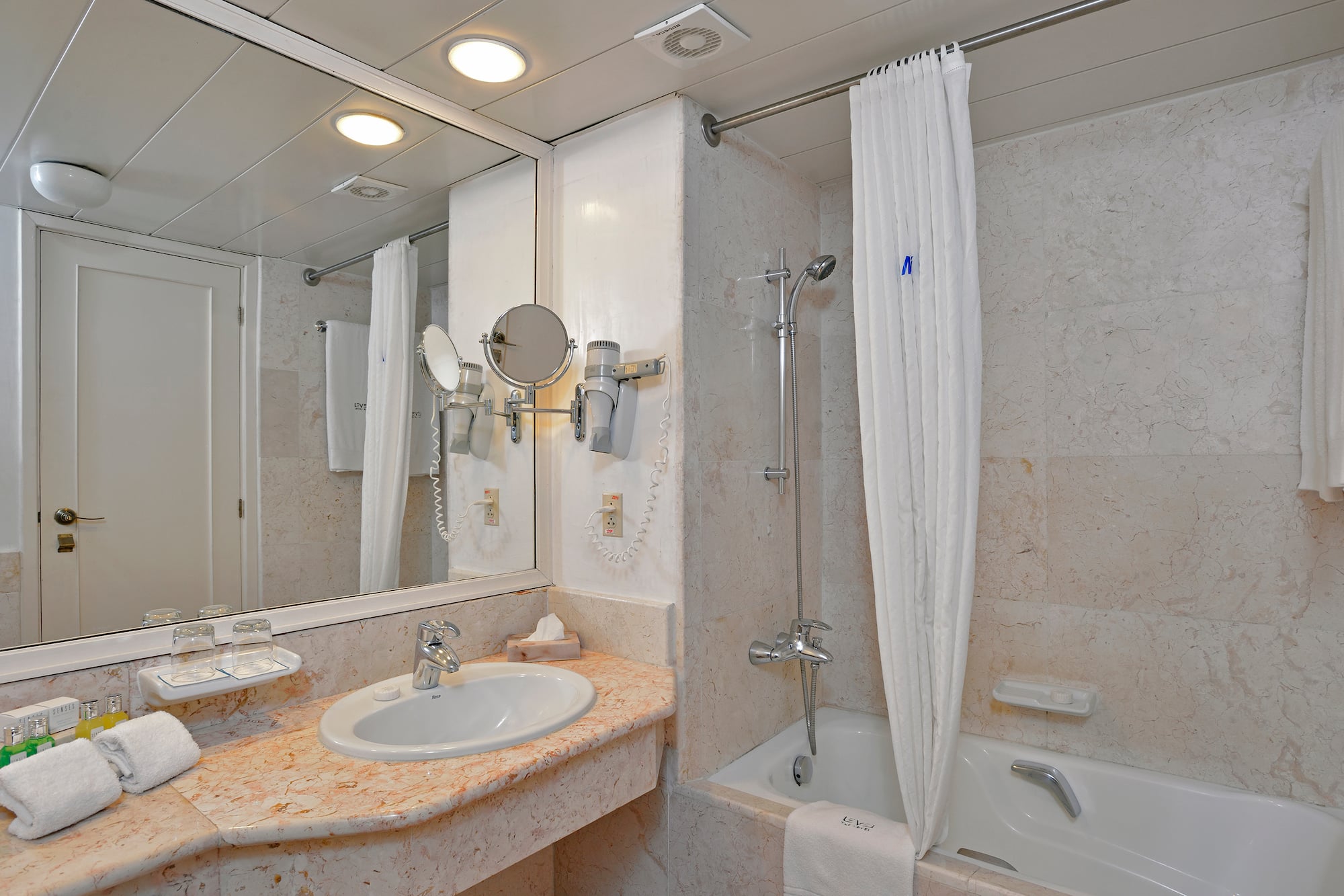 a bathroom with a sink and bathtub