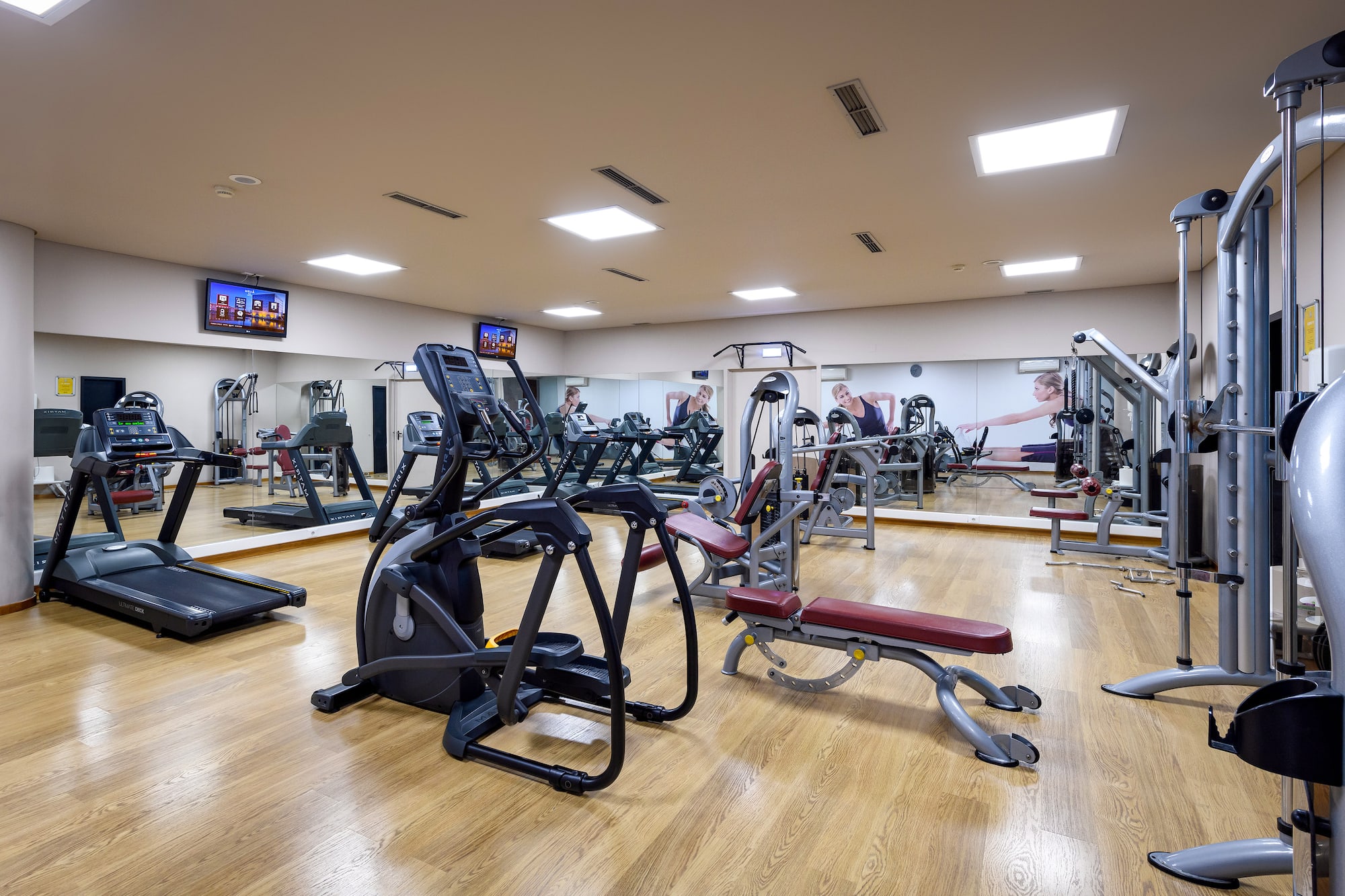 a large room with exercise equipment