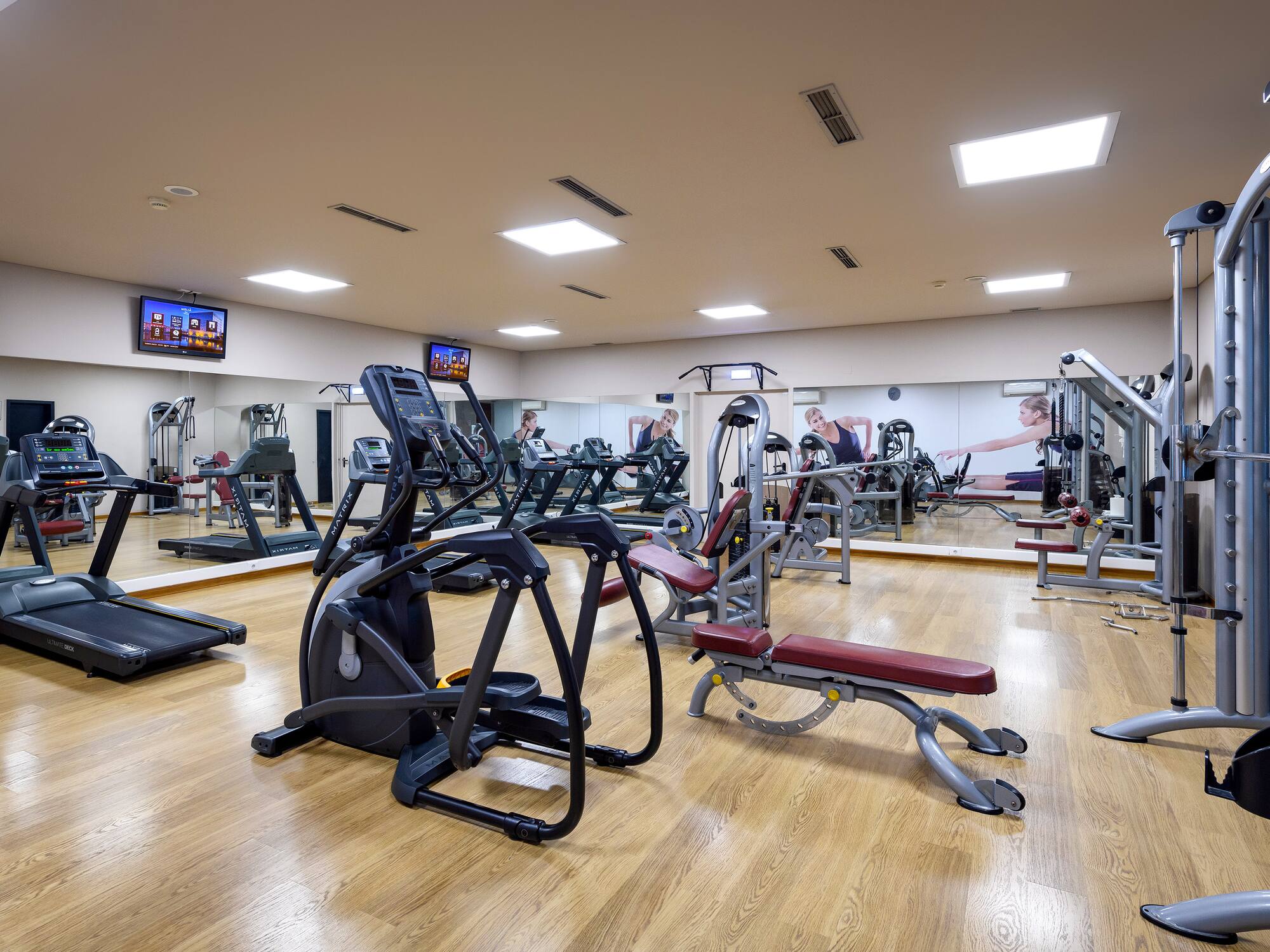 a large room with exercise equipment
