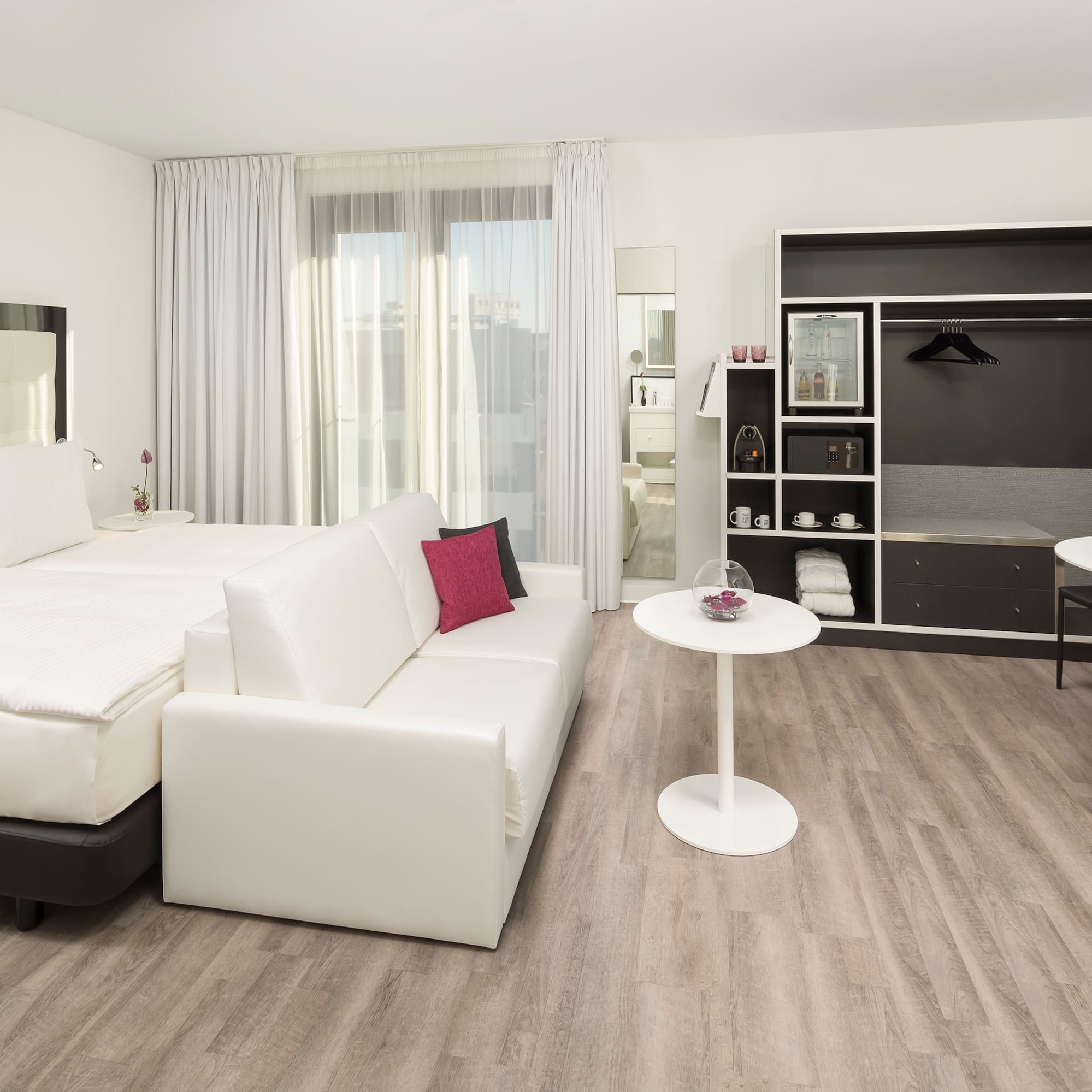 a room with a bed and a table