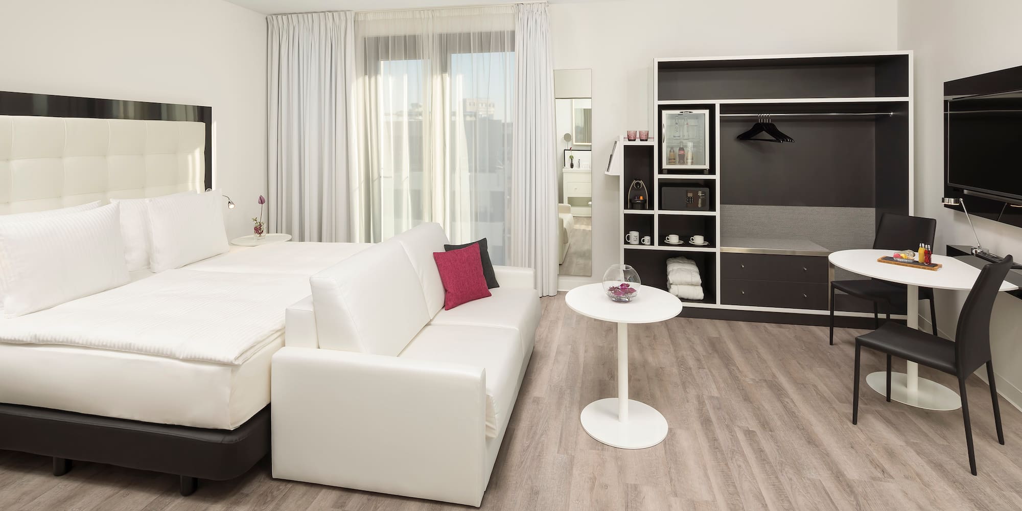 a room with a bed and a table