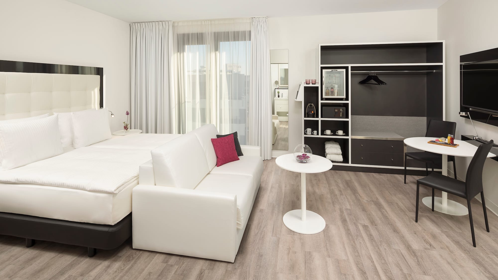 a room with a bed and a table