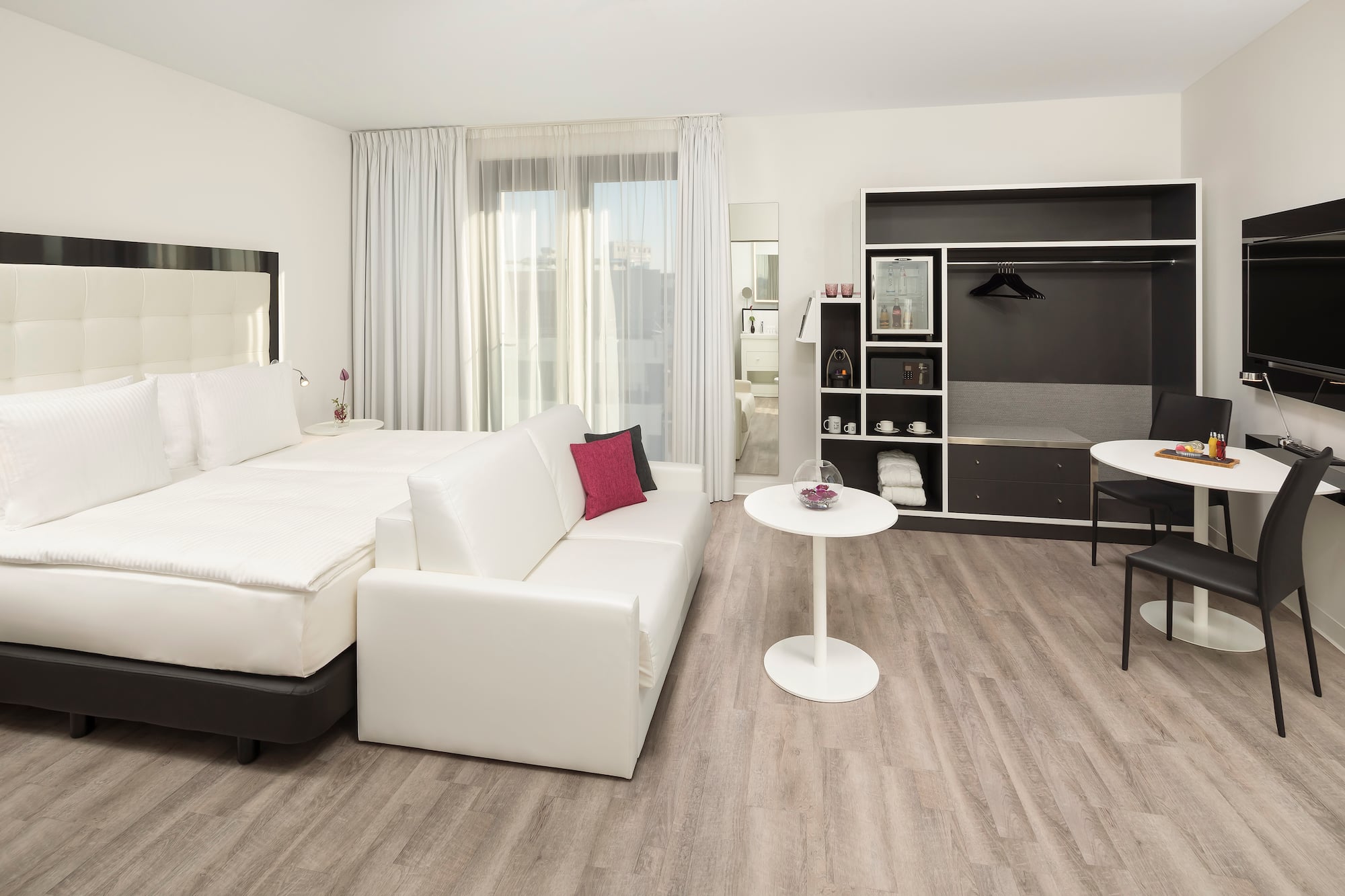 a room with a bed and a table