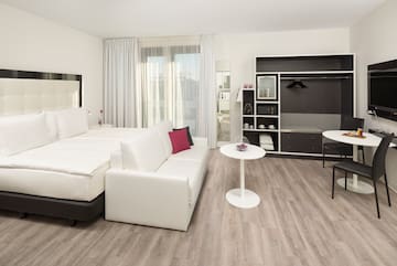 a room with a bed and a table