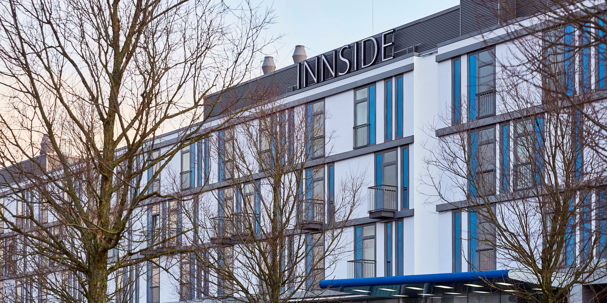 a building with trees in the background