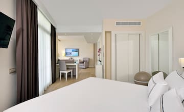 a room with a tv and a television