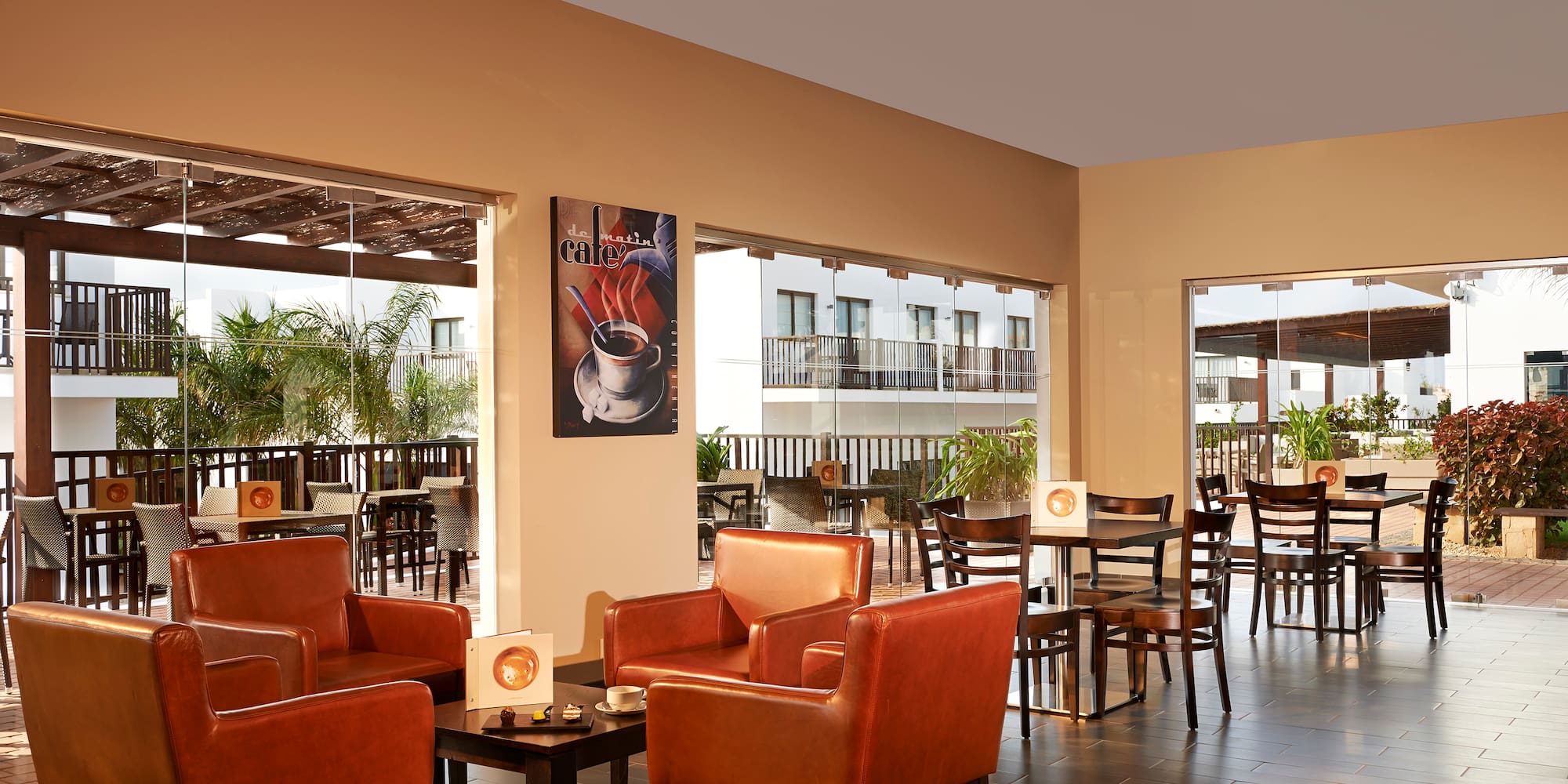 a room with chairs and tables