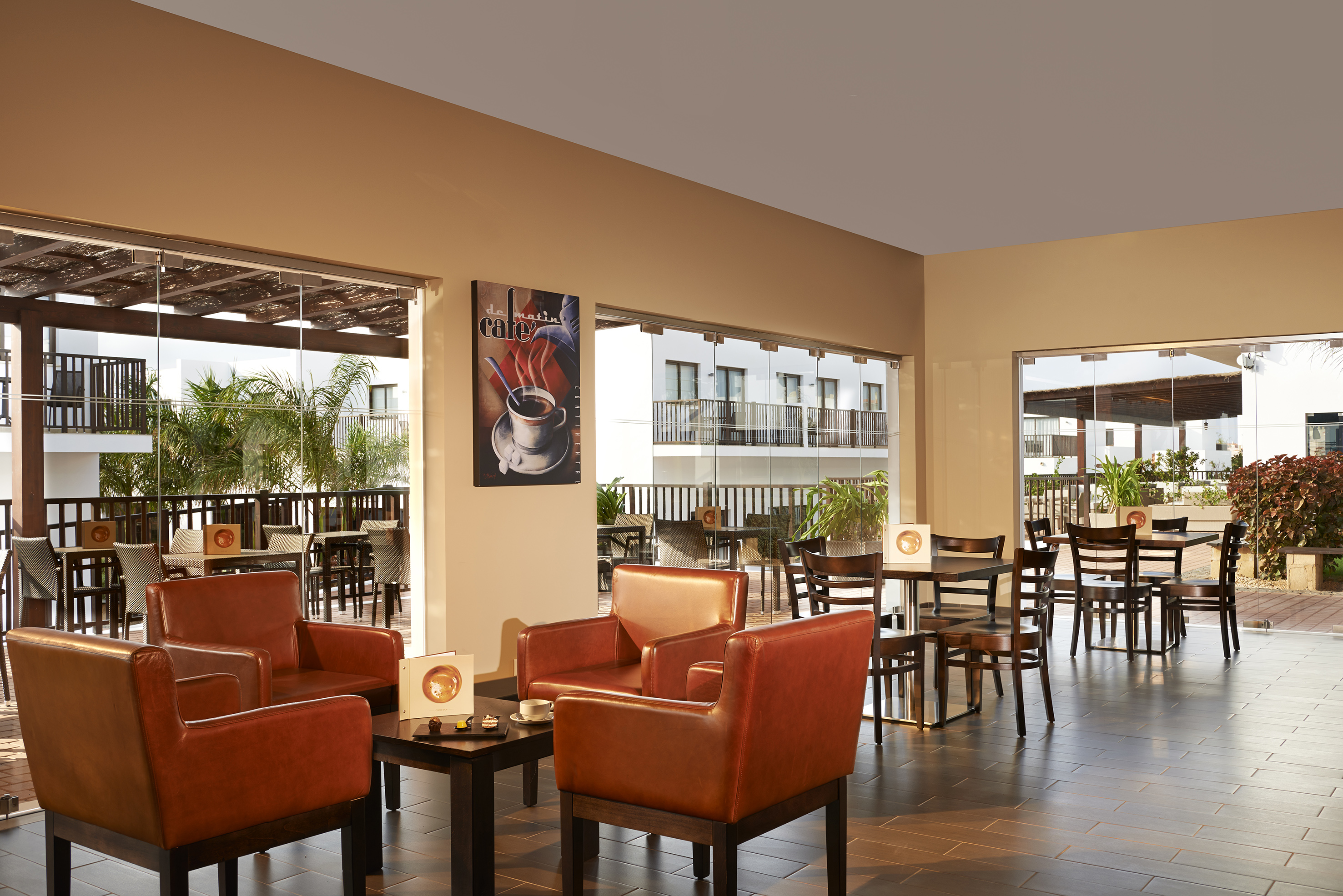 a room with chairs and tables