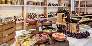a buffet with different food items on it
