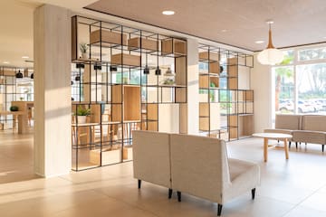 a room with a couch and shelves