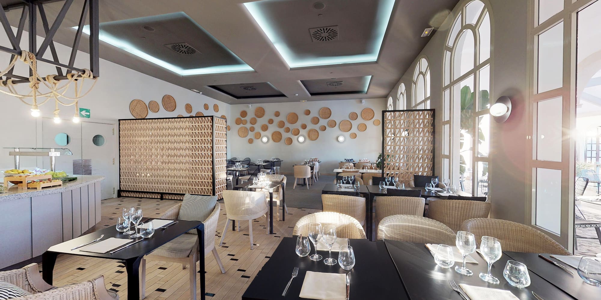 a room with tables and chairs