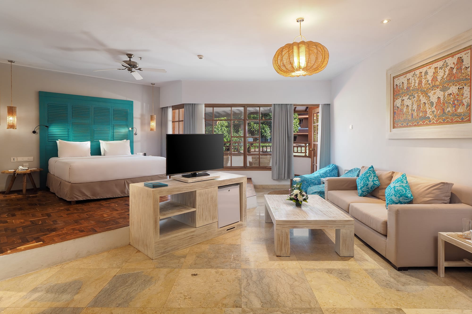 a room with a television and a bed