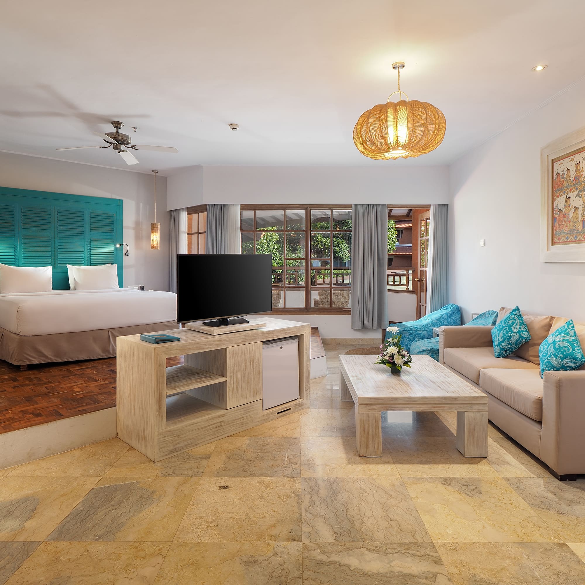 a room with a television and a bed