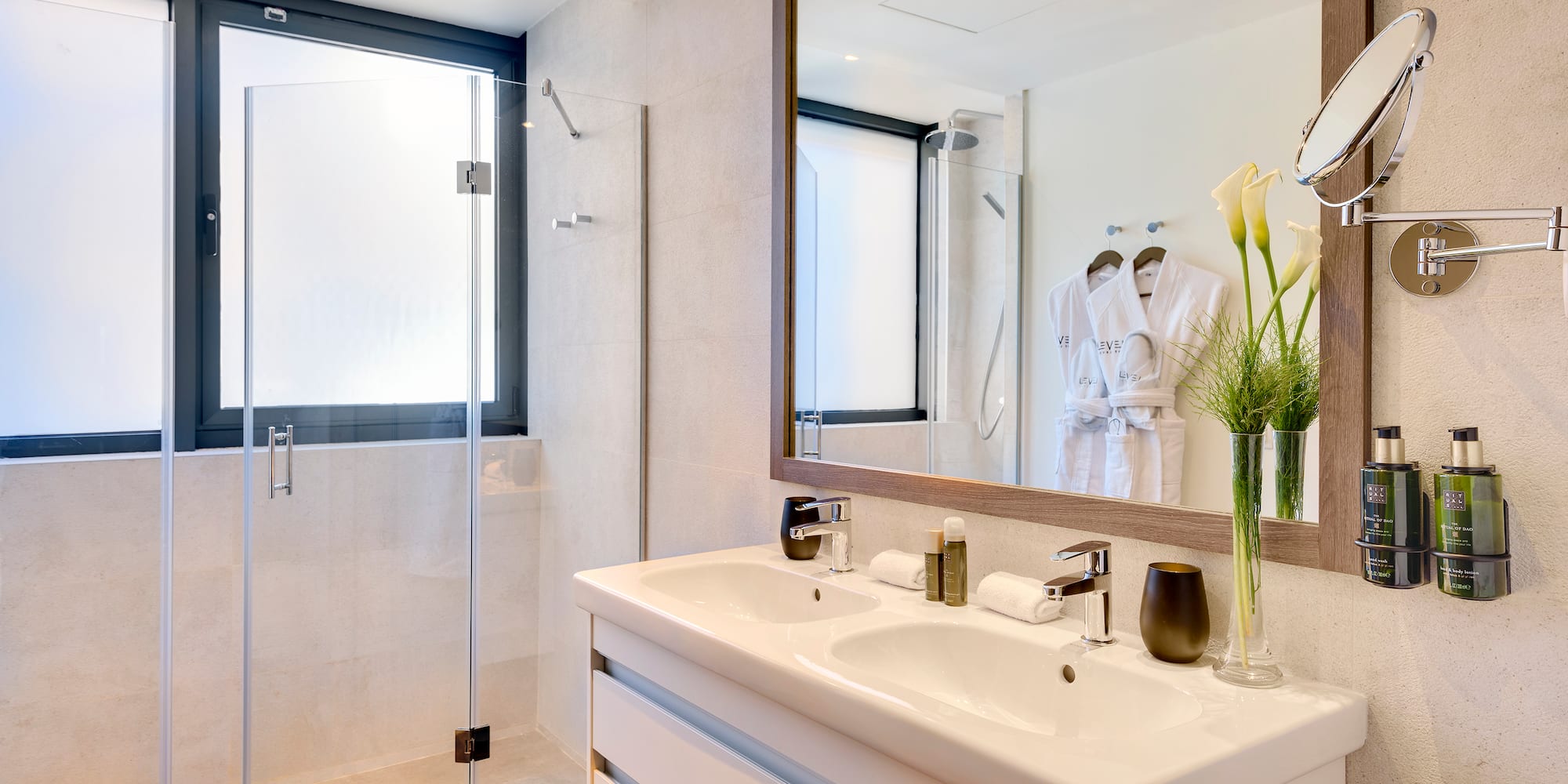 a bathroom with a mirror and sink